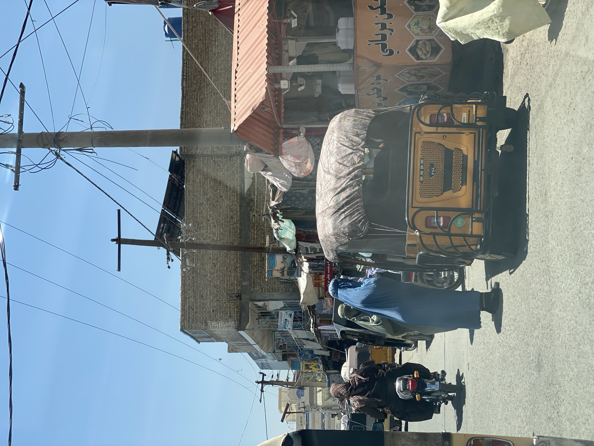 Kandahar street commerce on a busy summer morning