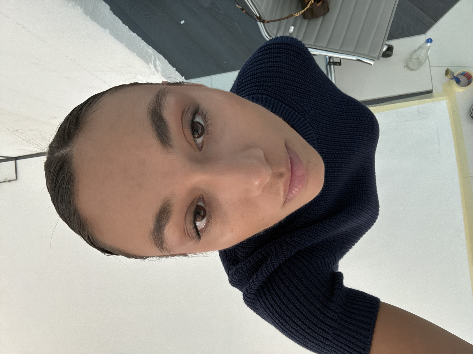 Photography session documented in Milan studio workspace