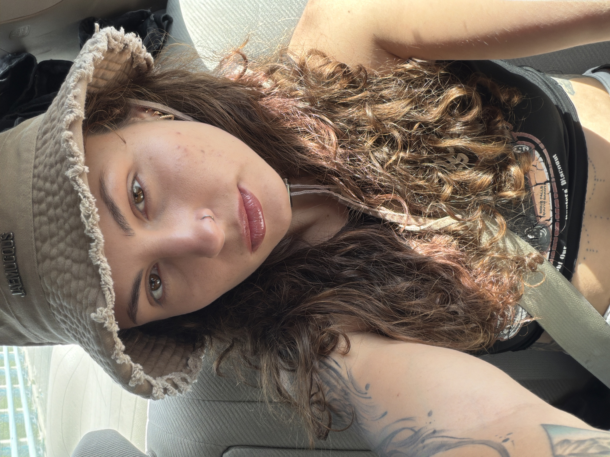 Woman takes selfie during morning journey through Jordan mountains