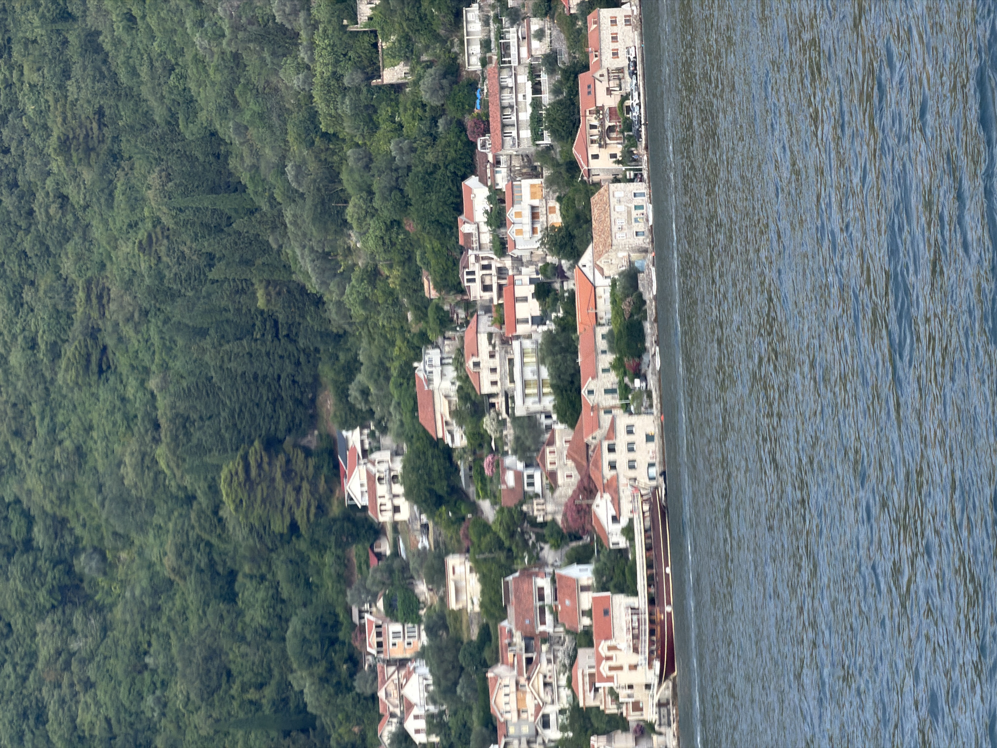 Bay of Kotor ferry crossing, busy summer afternoon on the water