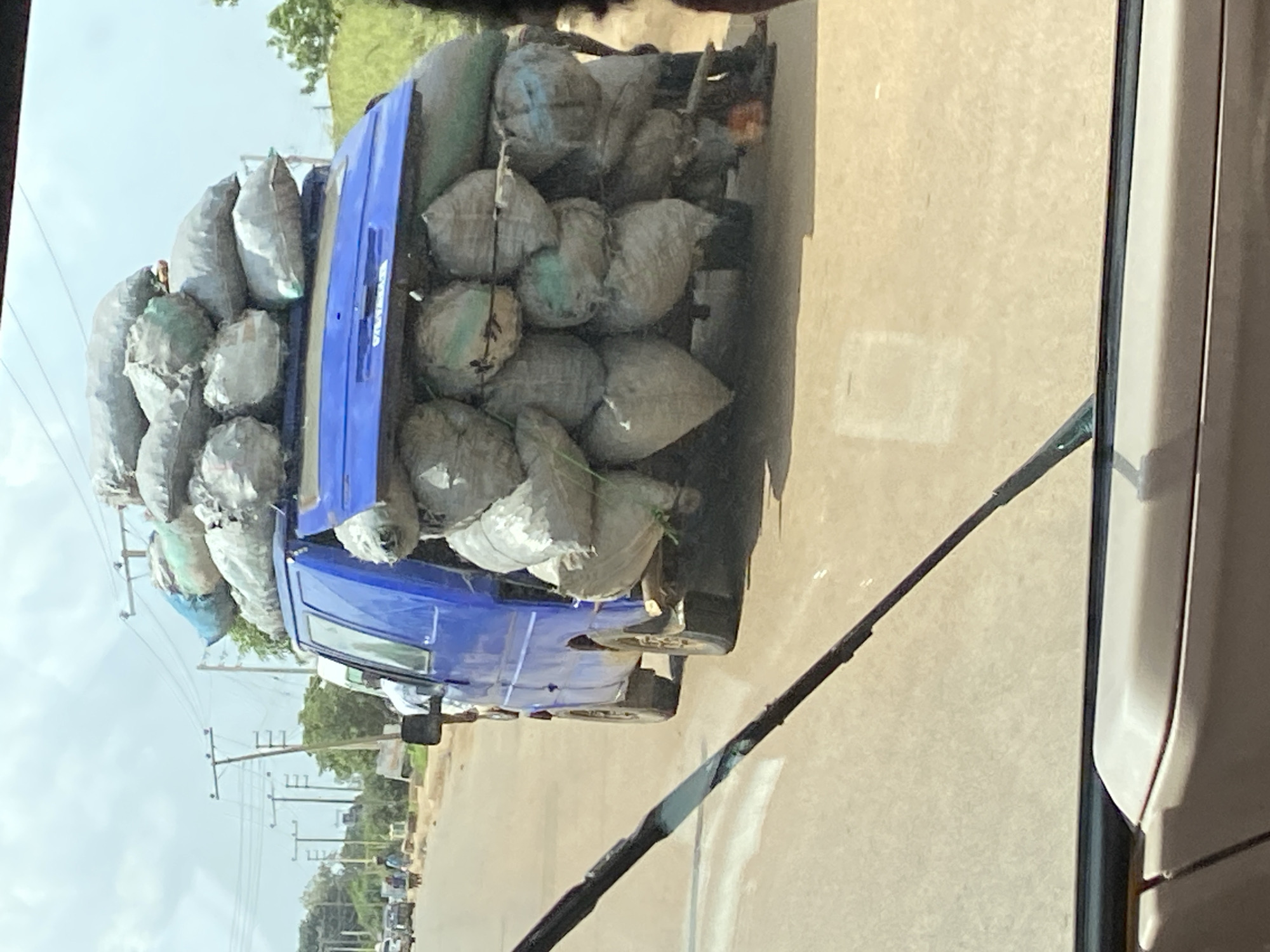 Afternoon commerce and street life in Bukuru, Nigeria