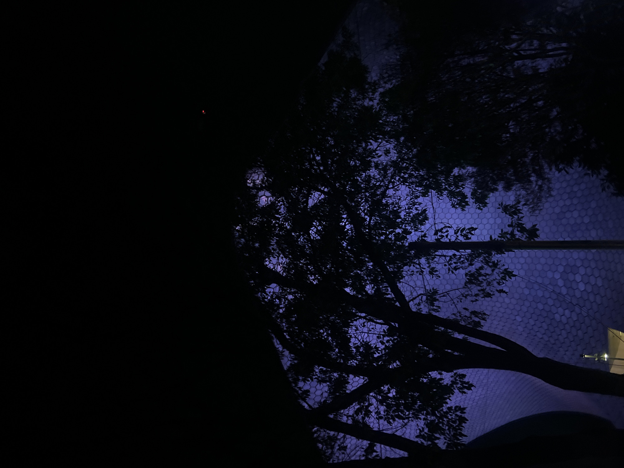 Illuminated hexagonal structure observed across Mexico City nighttime