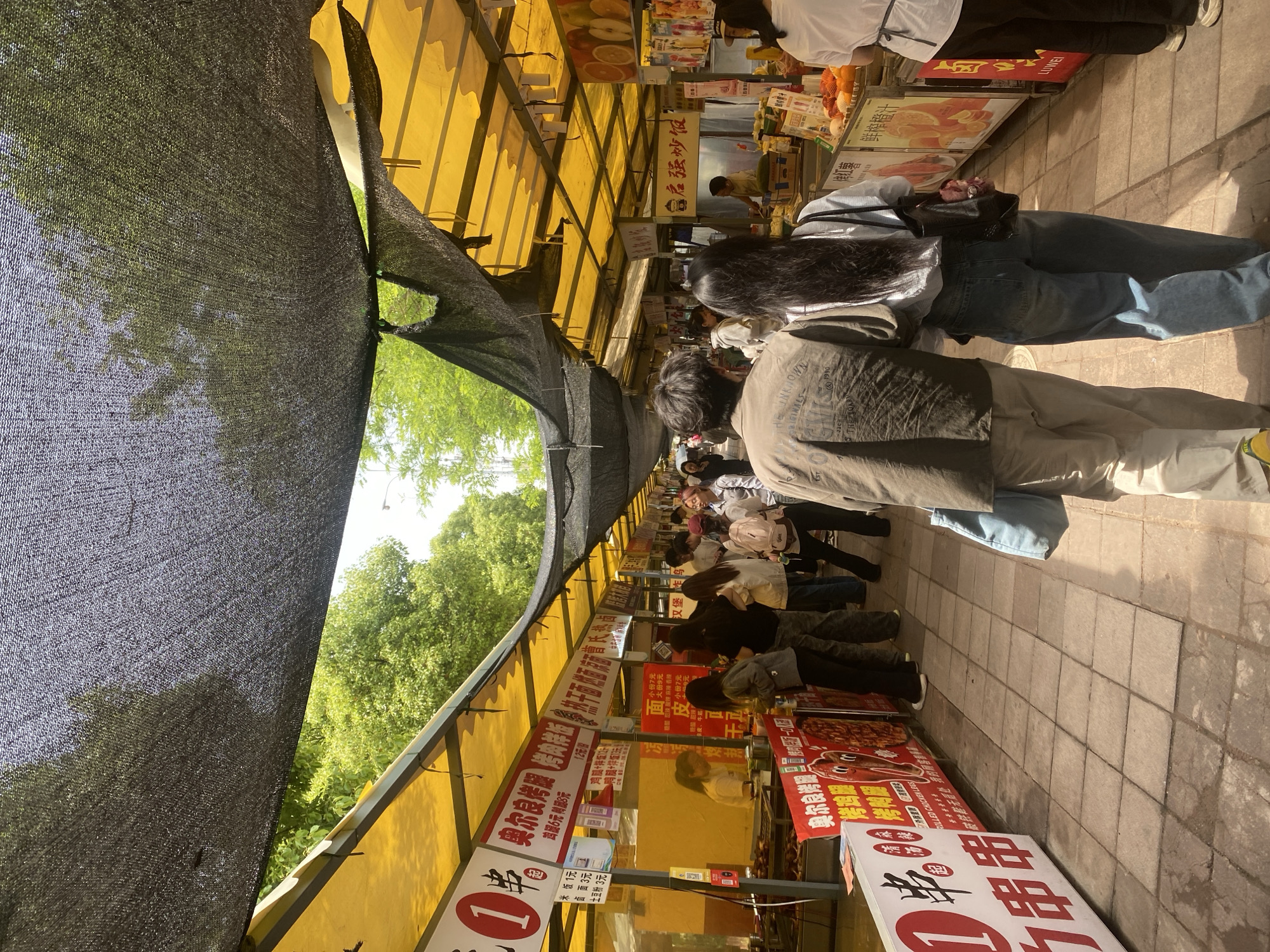 Early morning food market bustling in Shapingba District