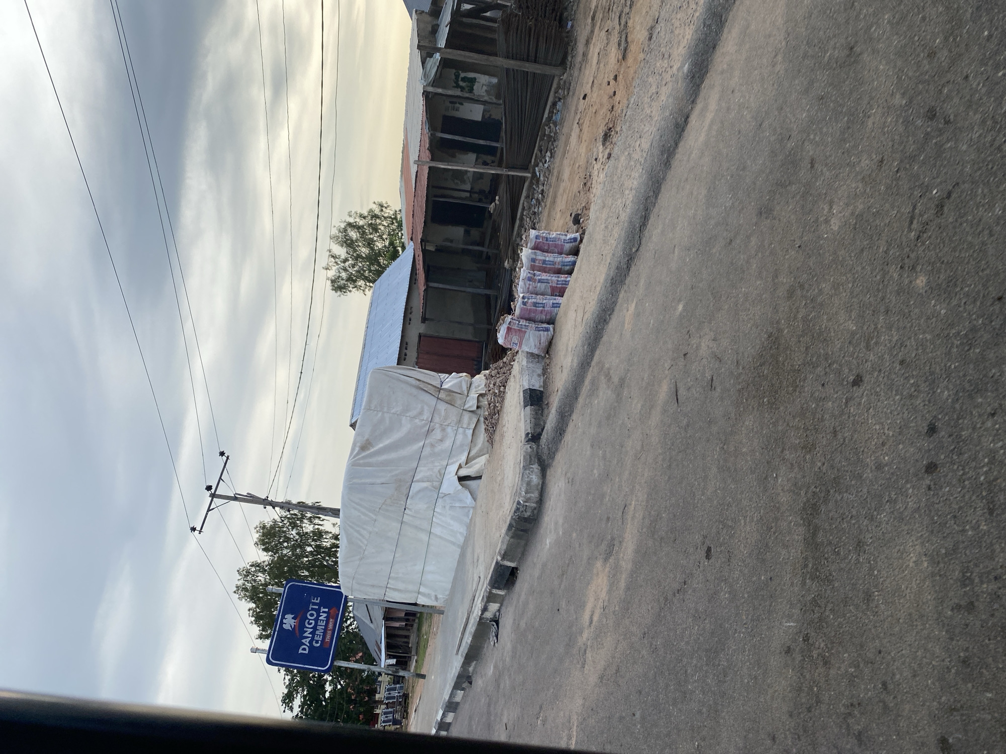 Drive through Jalingo streets with urban infrastructure and signage