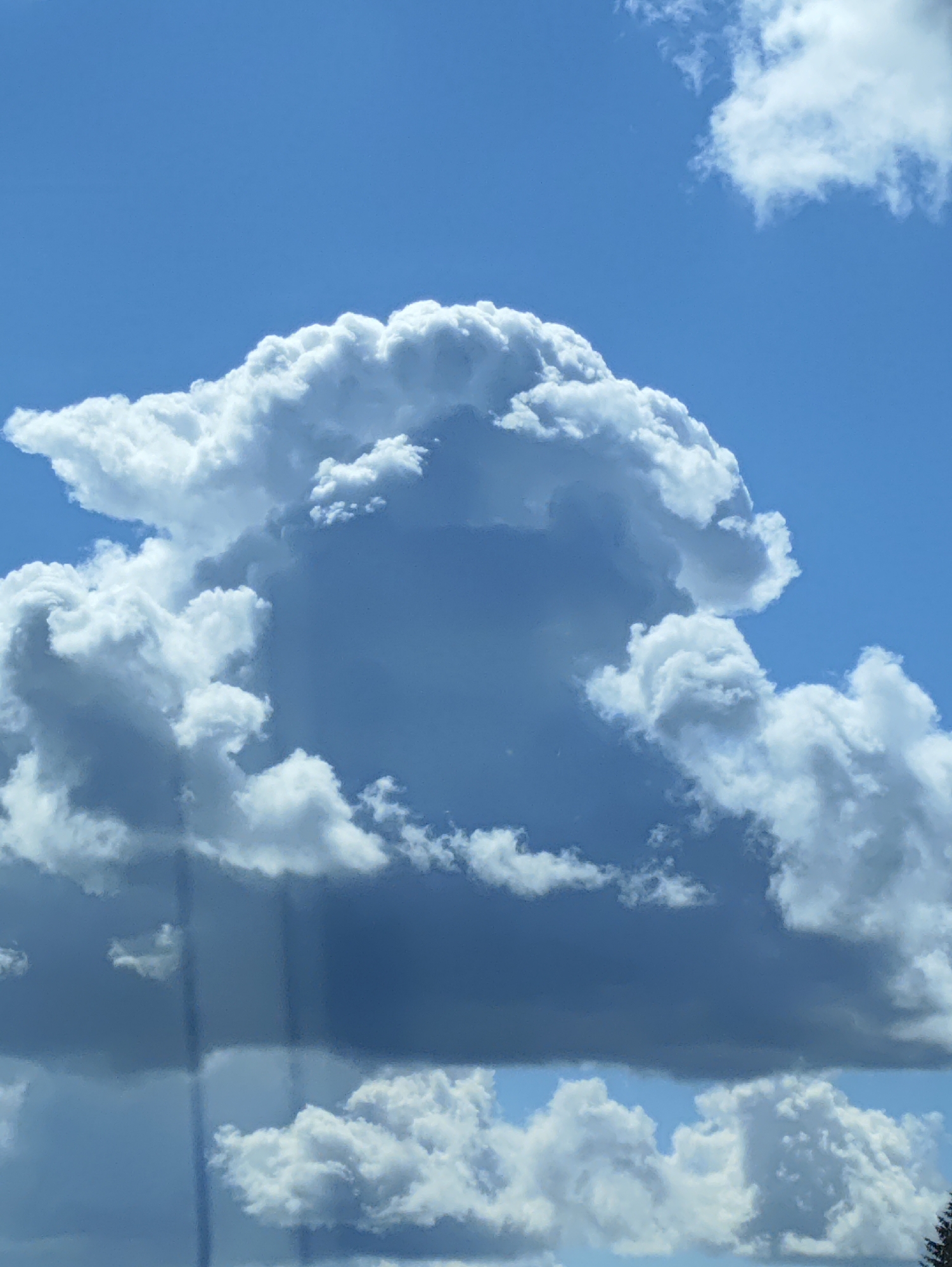 Mixed skies over Ādaži, Latvia — sun and storm clouds in tension
