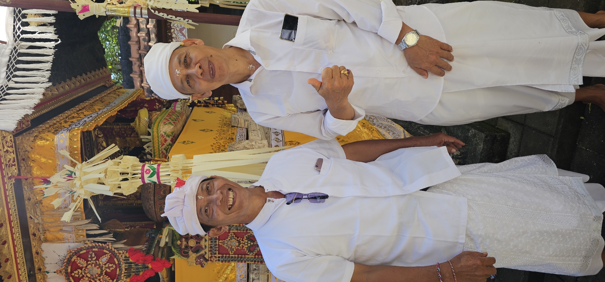 Traditional Balinese ceremony draws participants in white attire, Denpasar