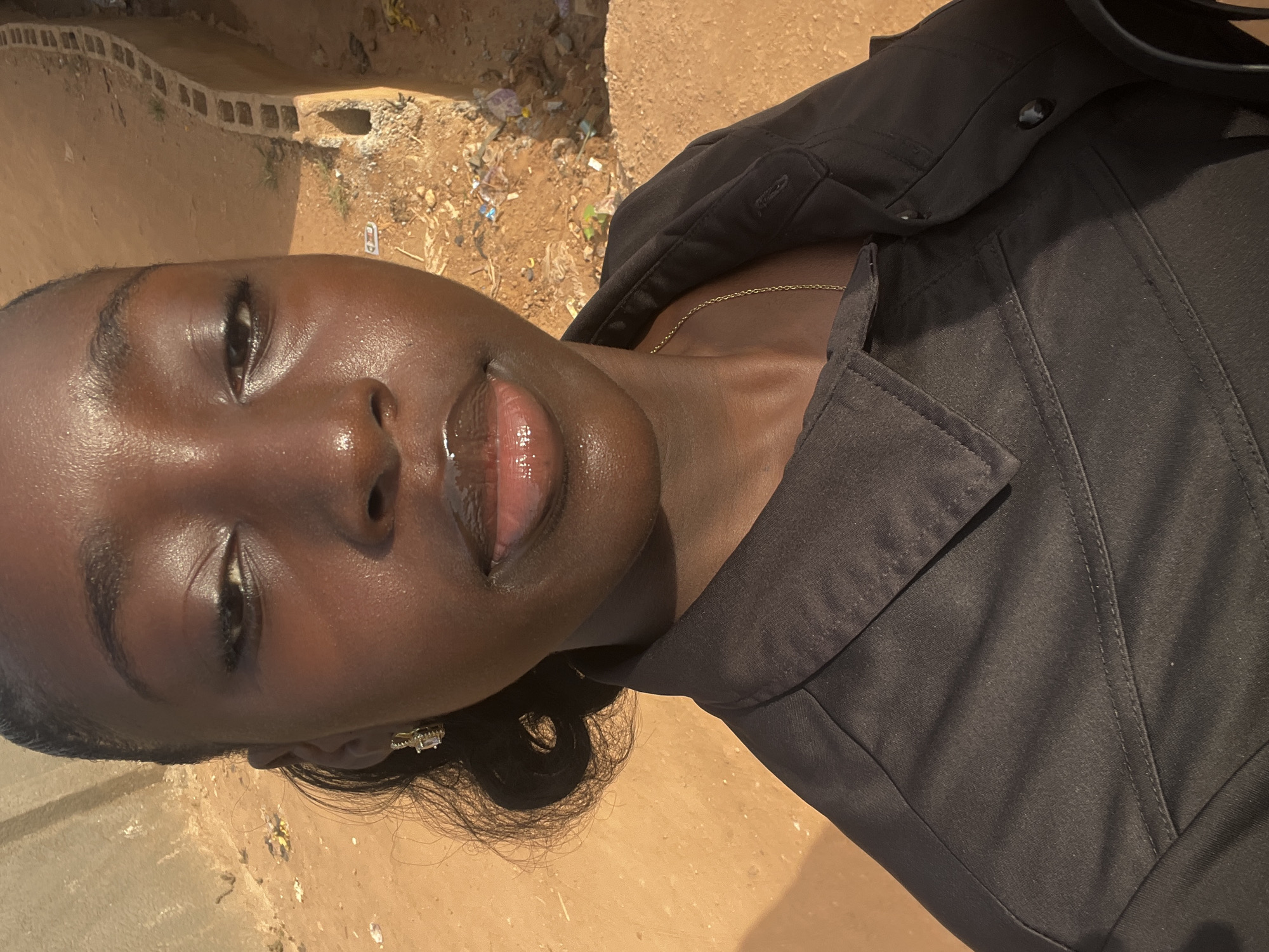 Morning street life documented in residential Abuja neighborhood