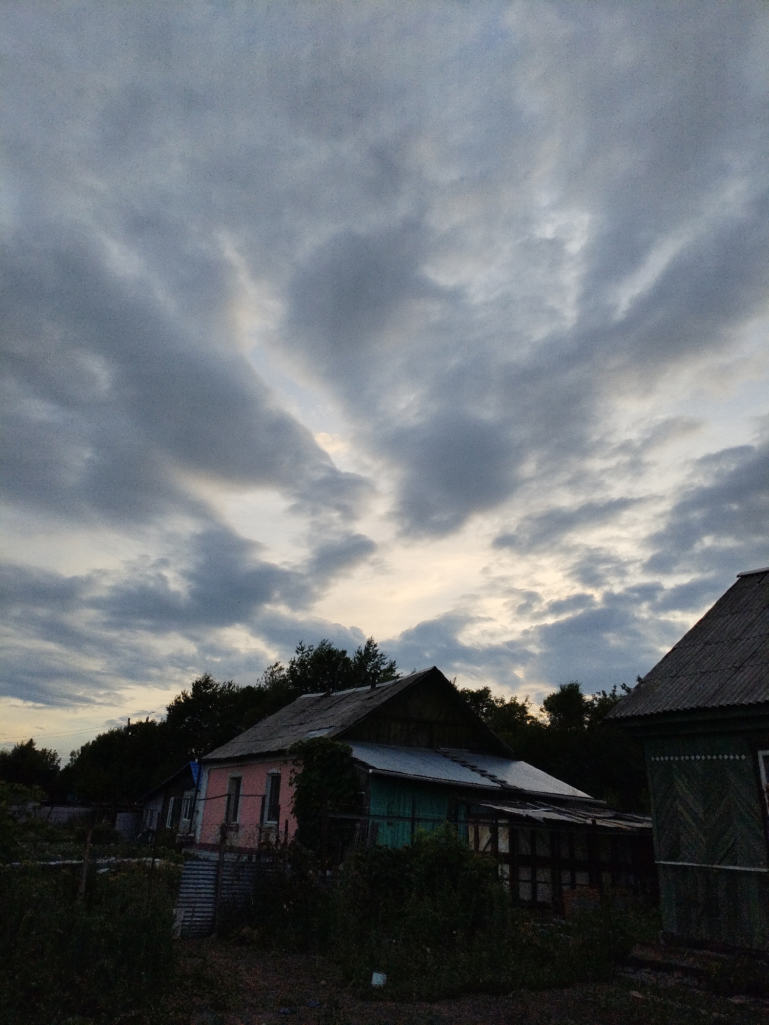 Summer evening at a Russian dacha yard, kids and garden
