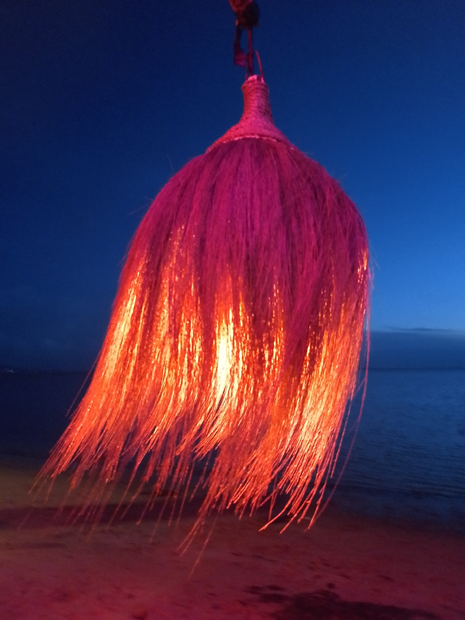 Ko Pha Ngan beachside restaurants illuminate at twilight