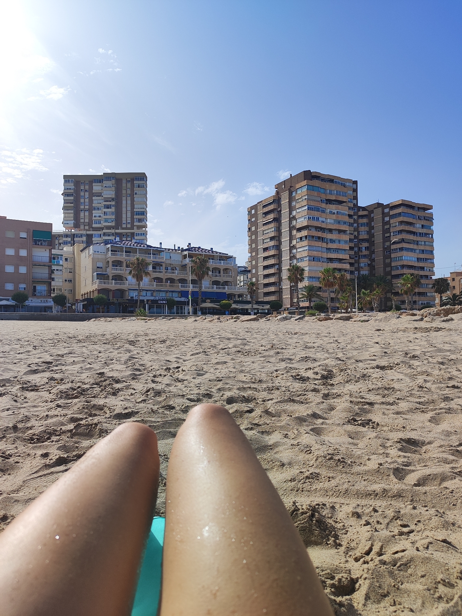 Lazy afternoon on the sand at El Campello beach