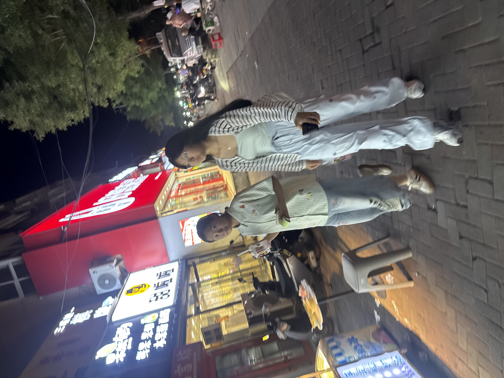 Evening street life along a Zhongtun neighborhood block