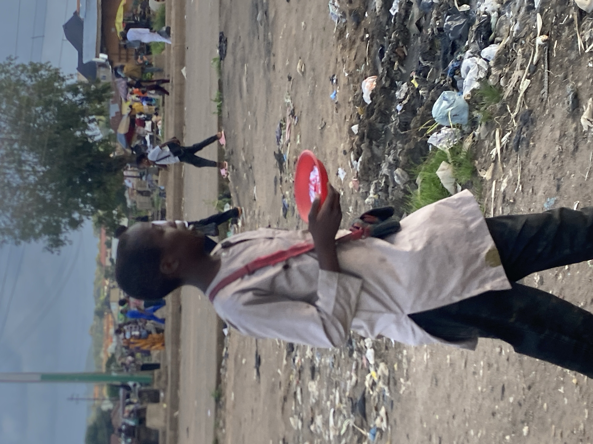 Street food and trade moving through Bukuru, Nigeria