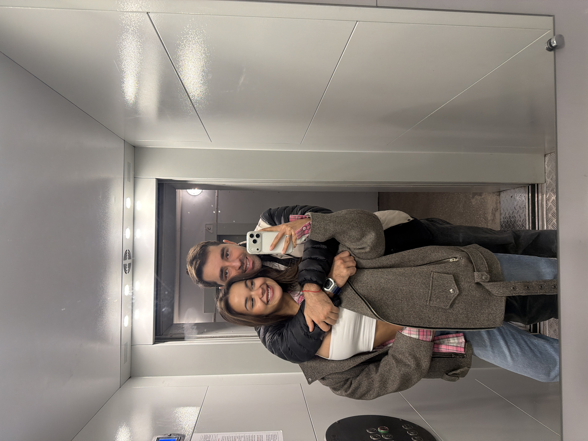Couple Takes Selfie in Krasnoyarsk Elevator