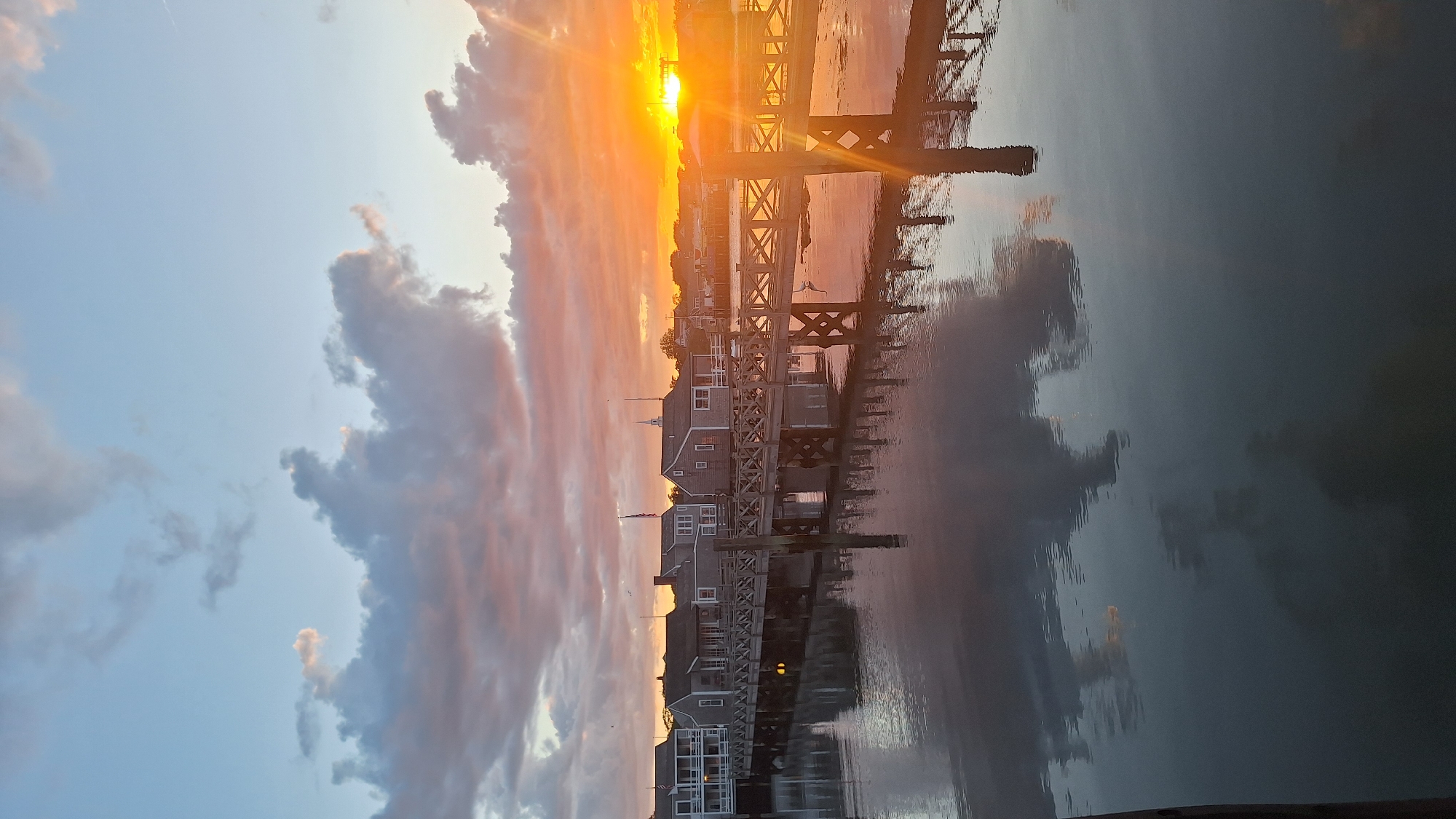 Sunset over Nantucket Harbor, docks and moored boats