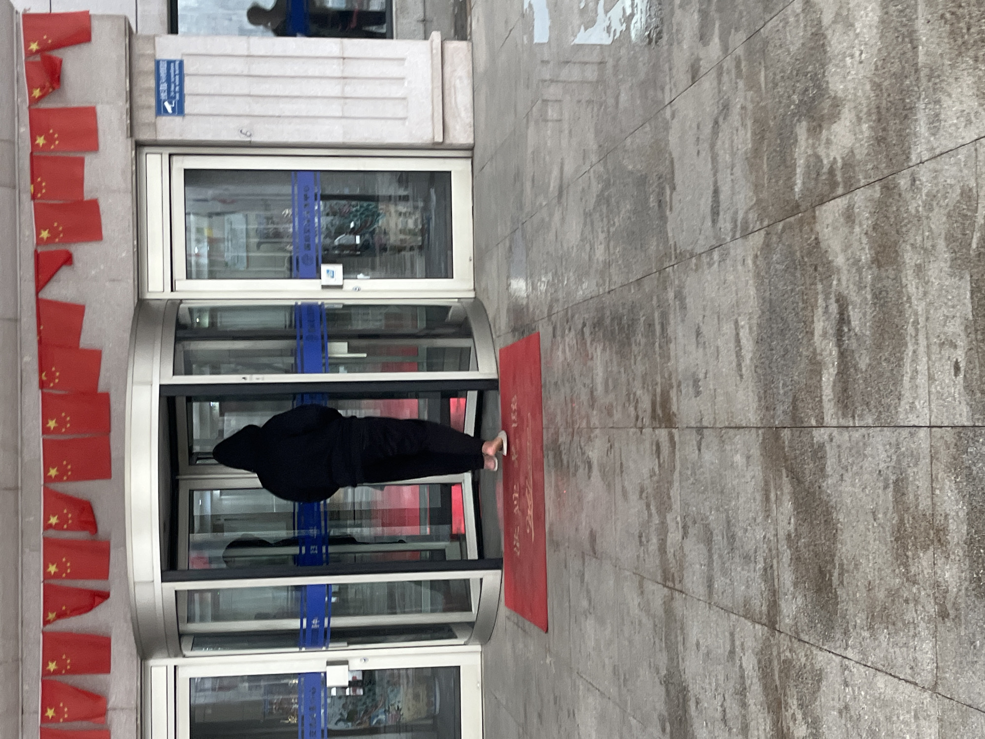 Rainy morning activities captured around Changchun building complex