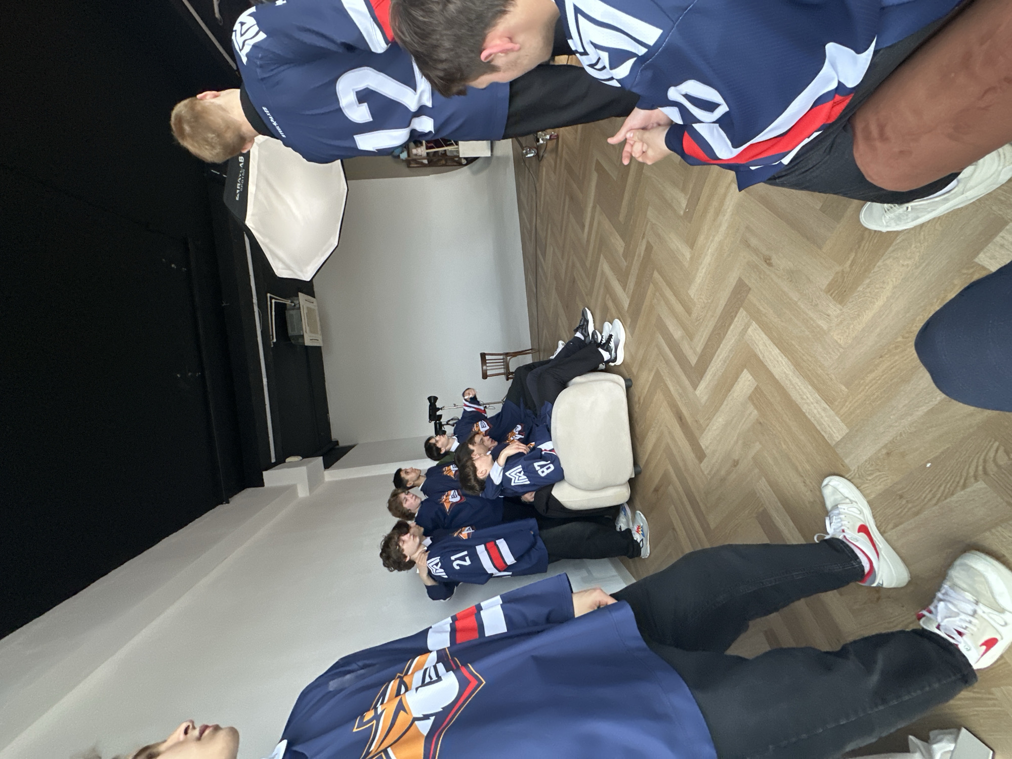 Hockey team photo shoot captured in studio setting