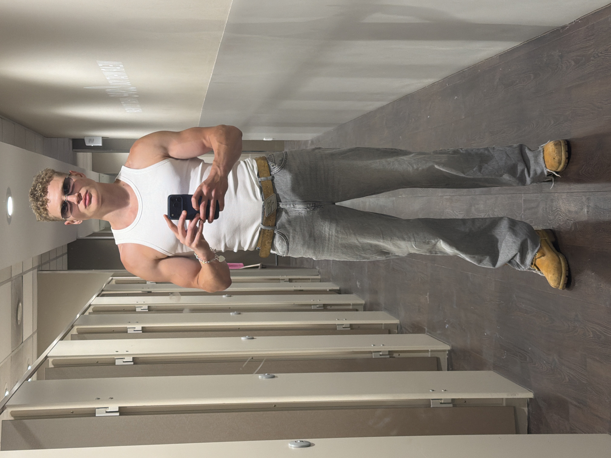 Man Takes Selfies in London Store Fitting Room