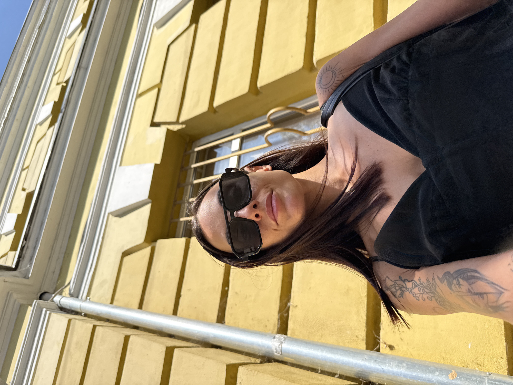 Selfies and a parked Maserati on a Pleven street