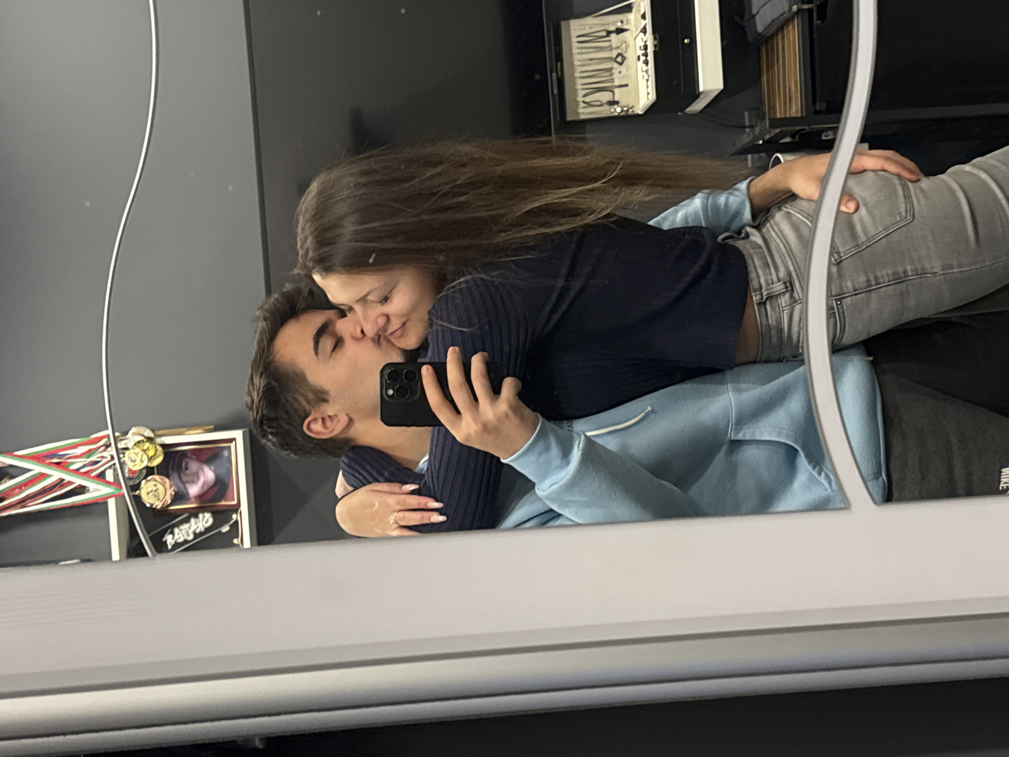 Couple takes romantic selfies in mirror in Sofia