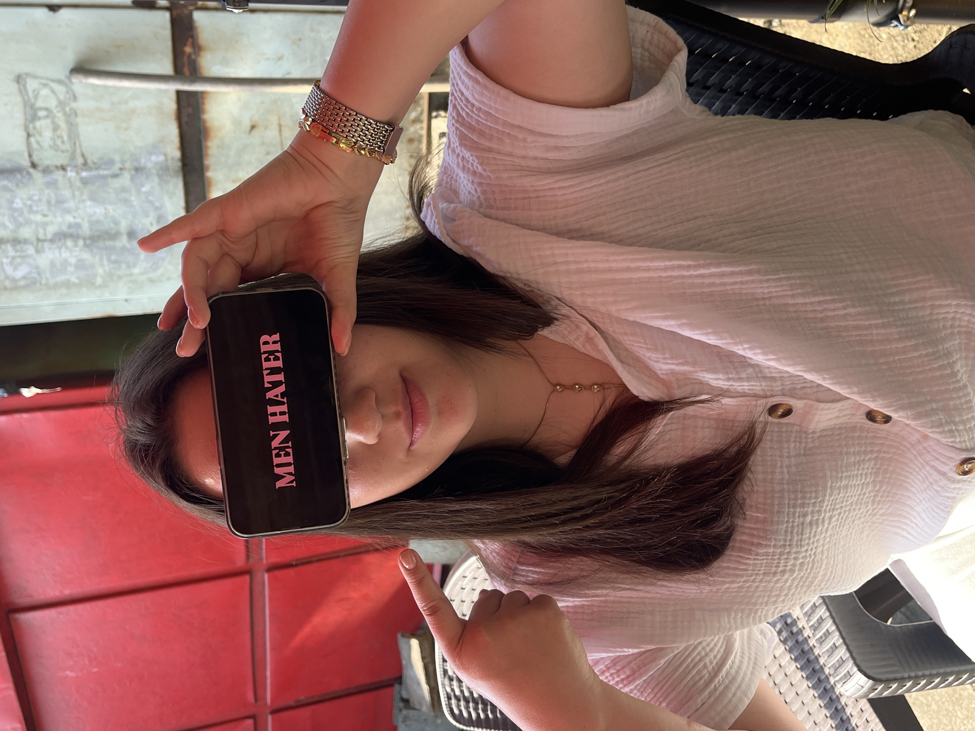 Woman takes playful selfies in Karnobat, Bulgaria