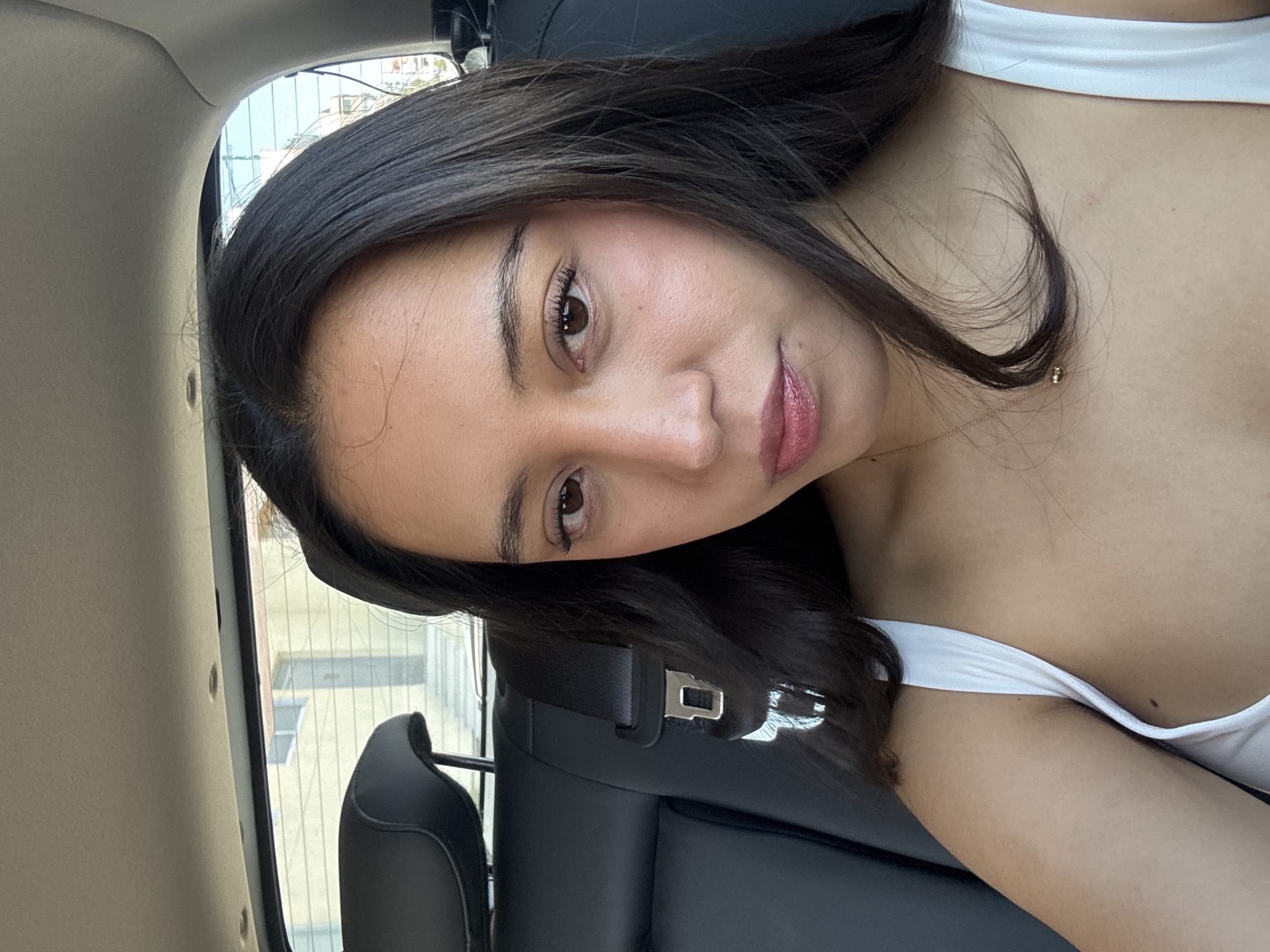 Woman observed sitting in car in urban Puebla