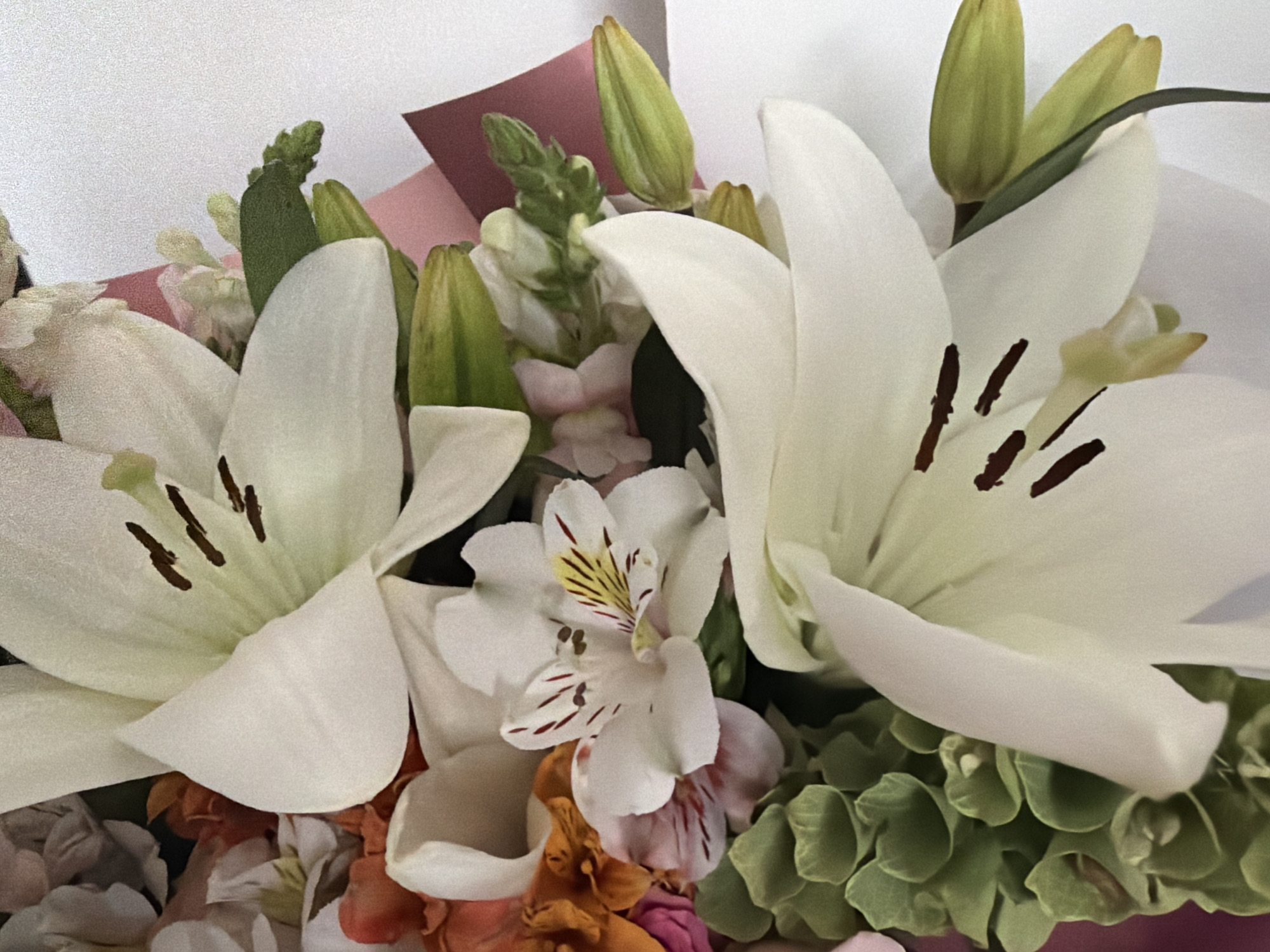 Flower bouquet with white lilies photographed by unknown witness