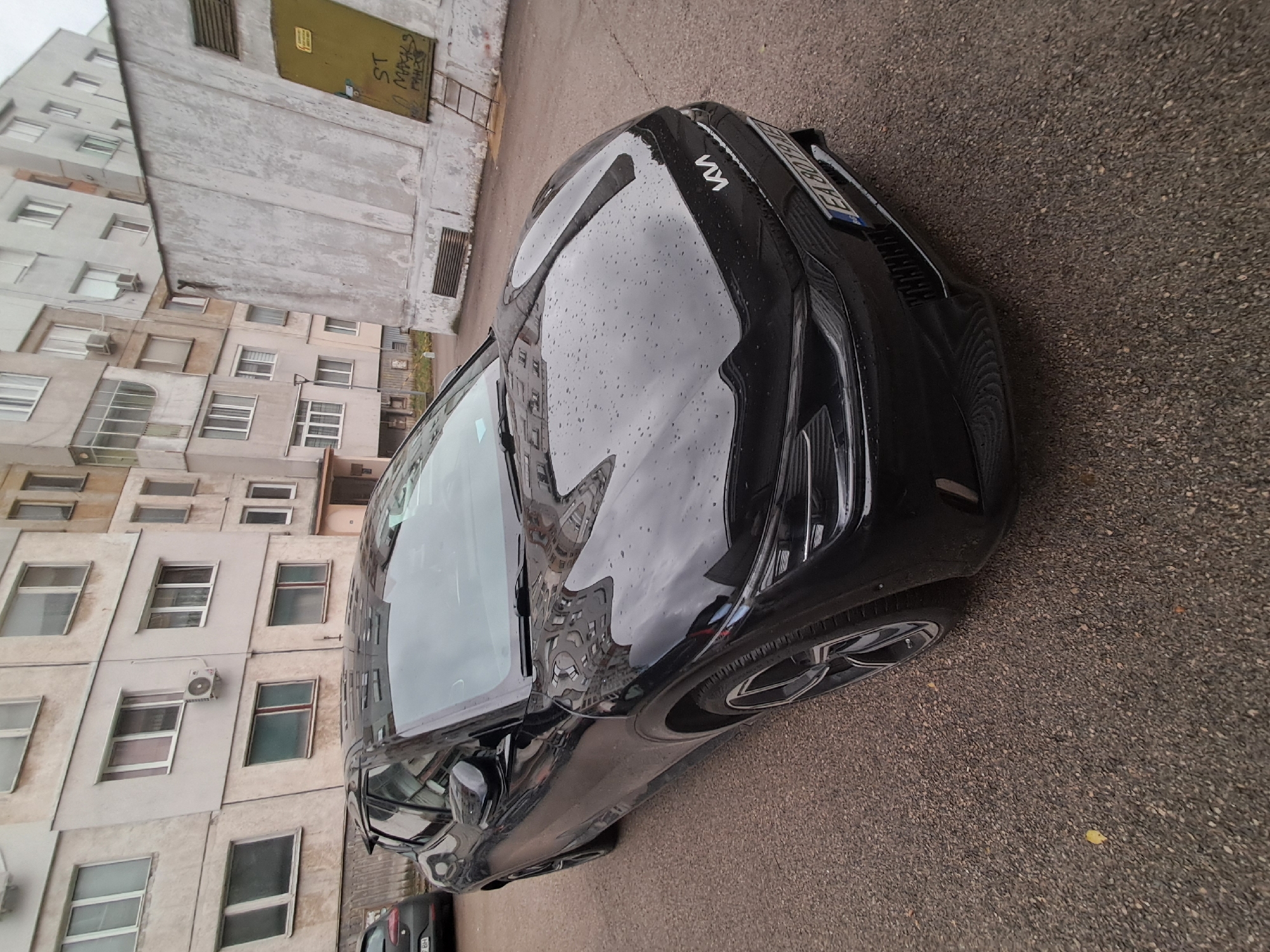 Everyday scenes documented in Gabrovo: parked car, dartboard