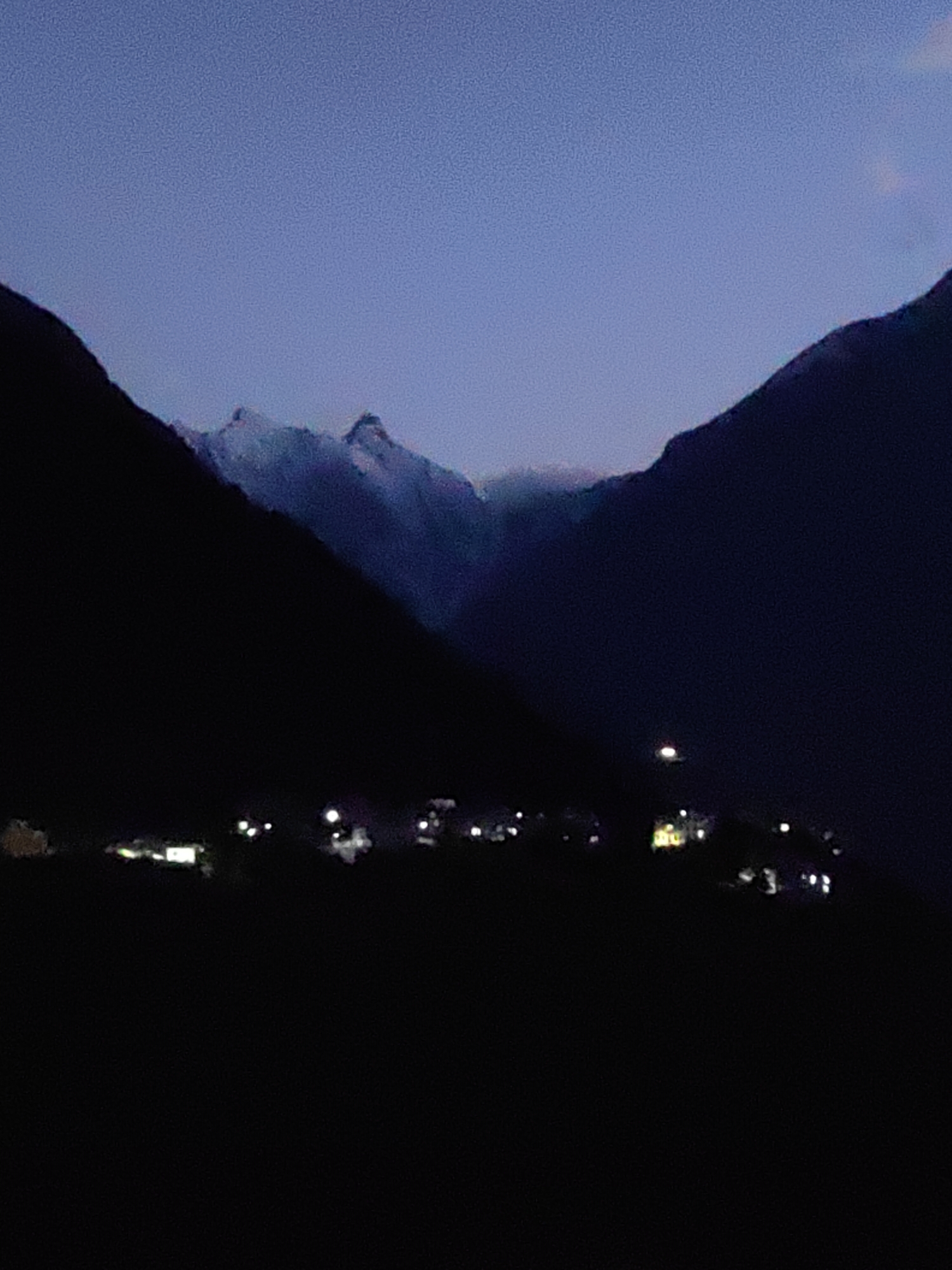 Dusk falls over a Himalayan valley village in Keylang