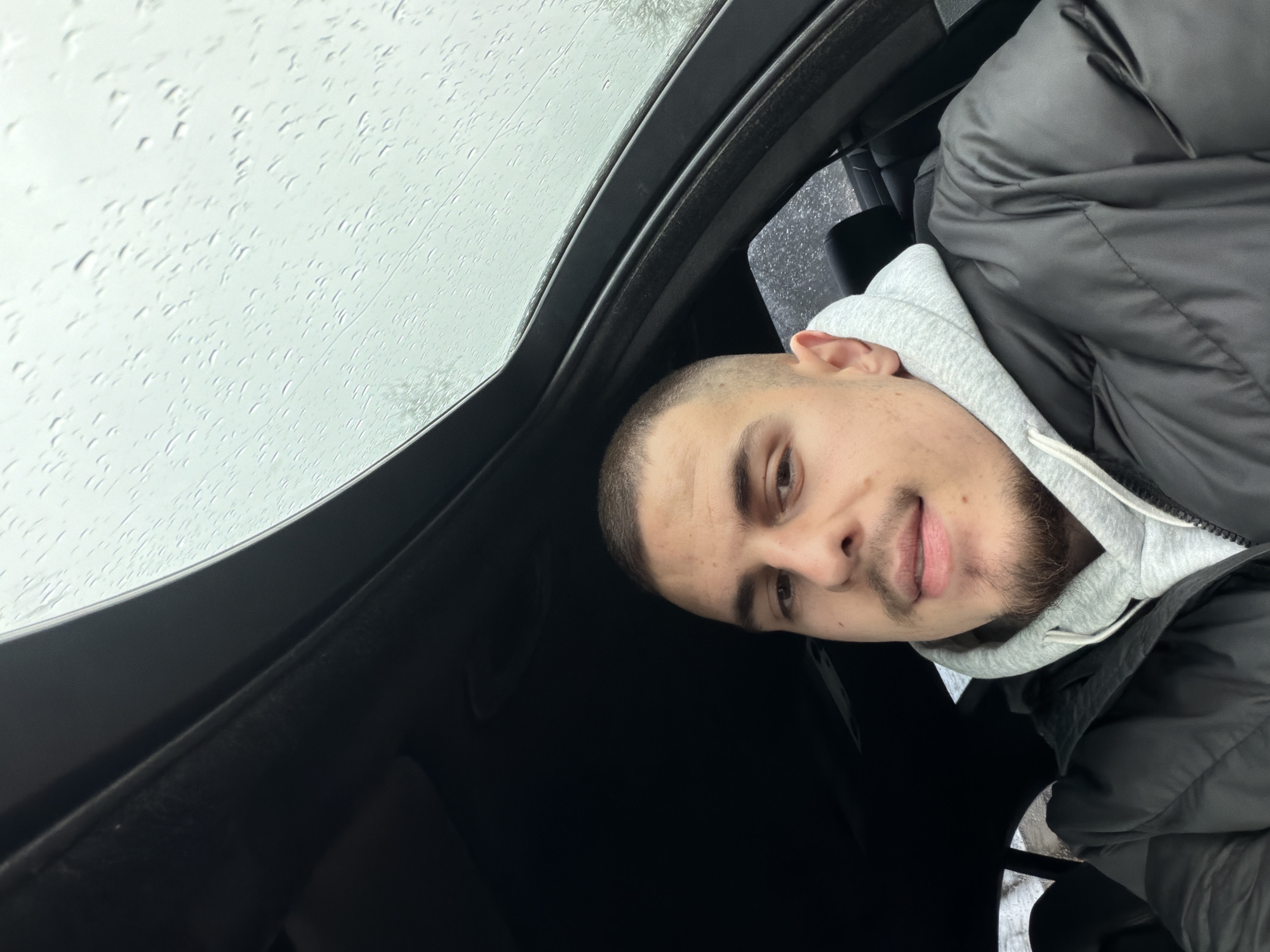 Man photographed in car during rainy weather in Plovdiv