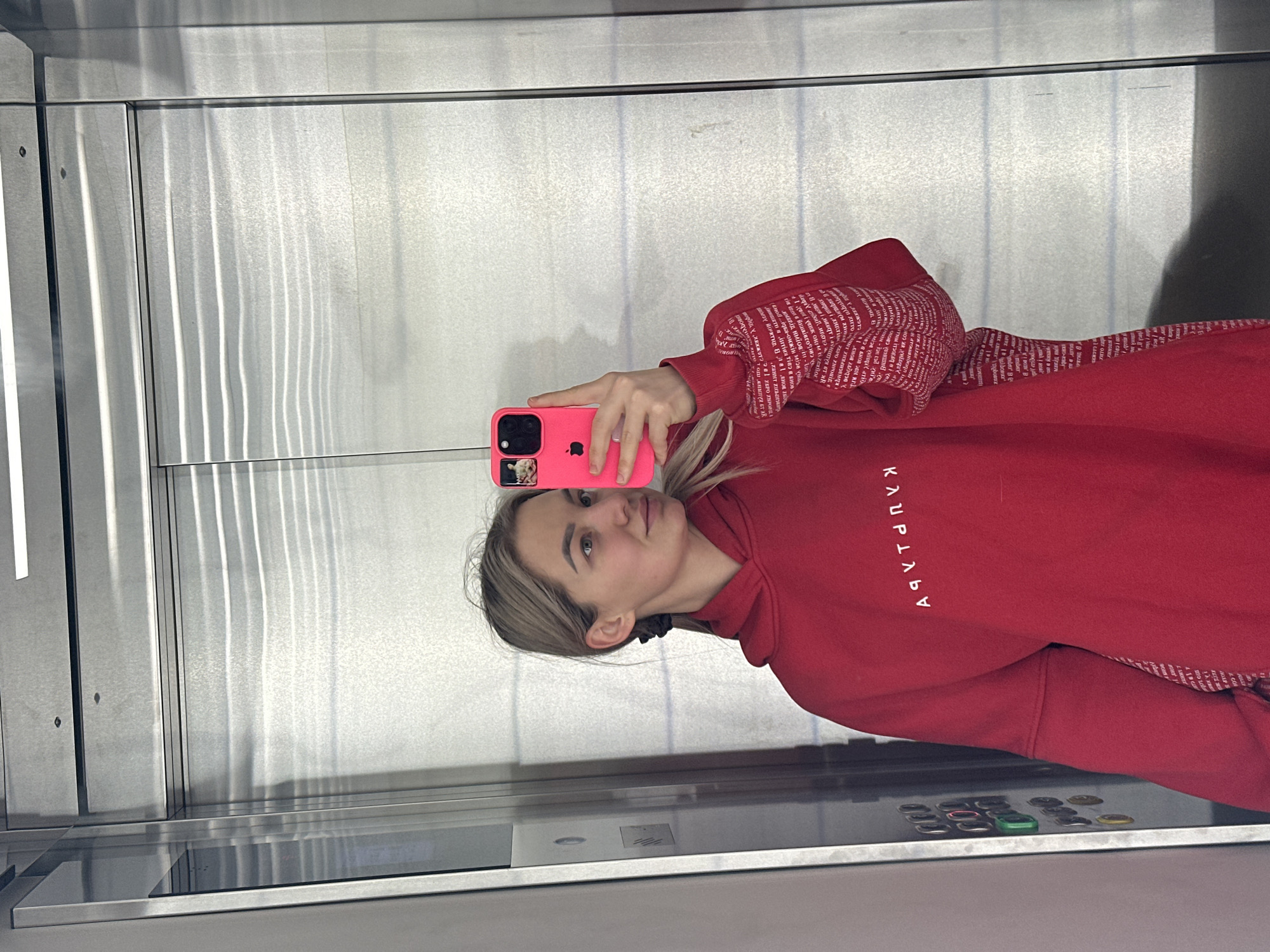 Woman documents morning routine with elevator selfies in Budva