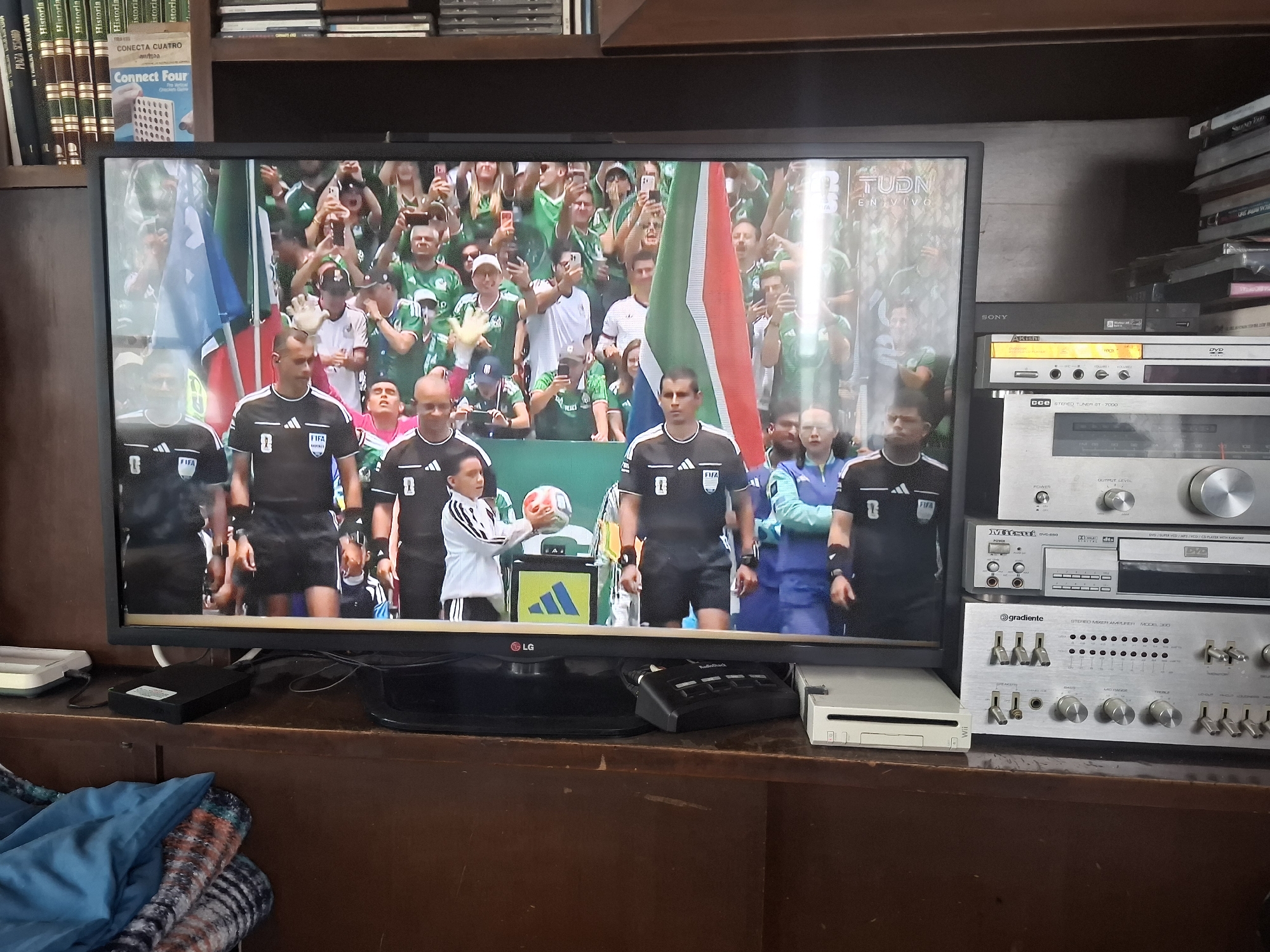Soccer Match Viewing Session Captured in Mexican Living Room