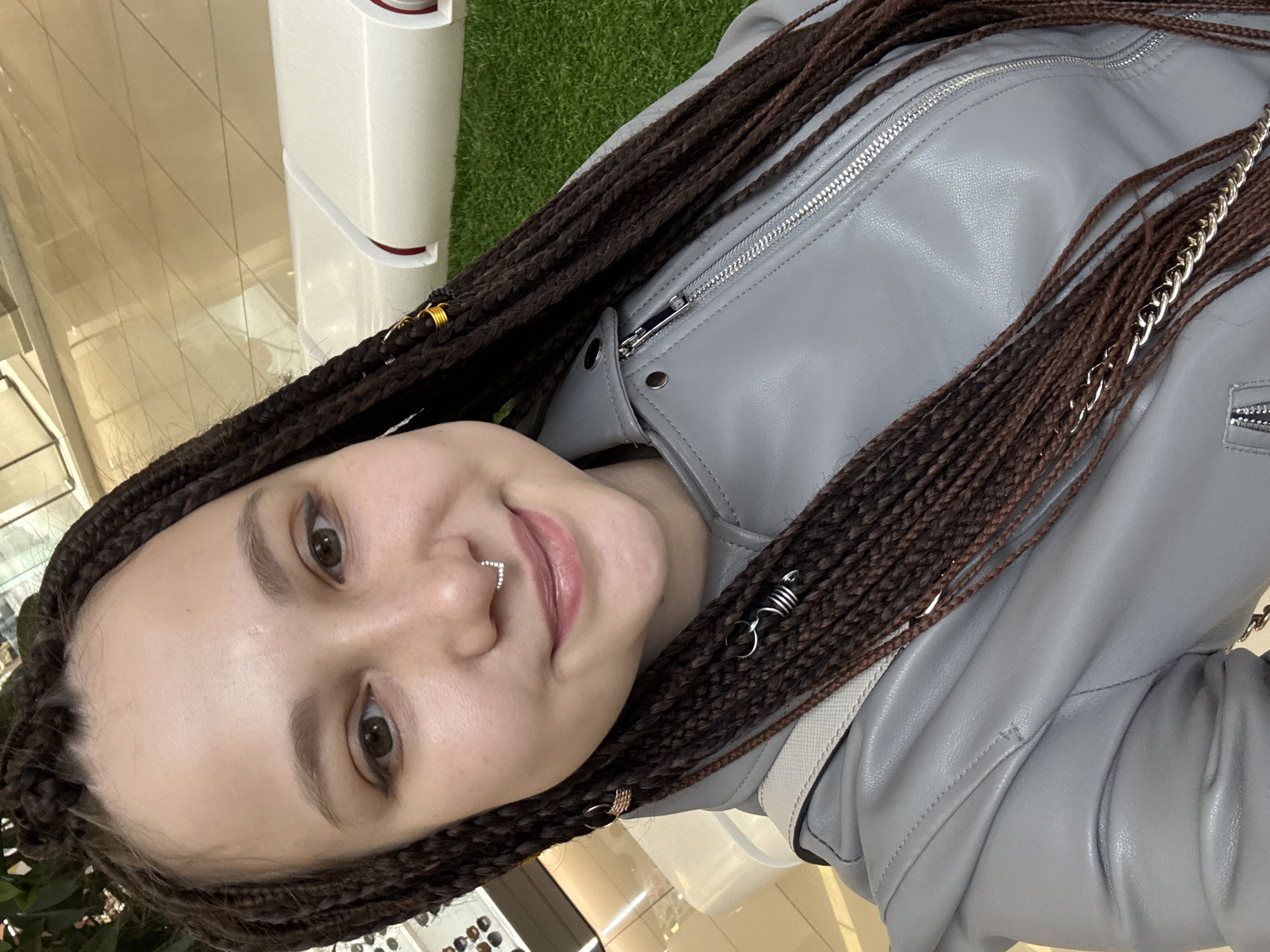 Woman takes selfie with braided hair in Saratov