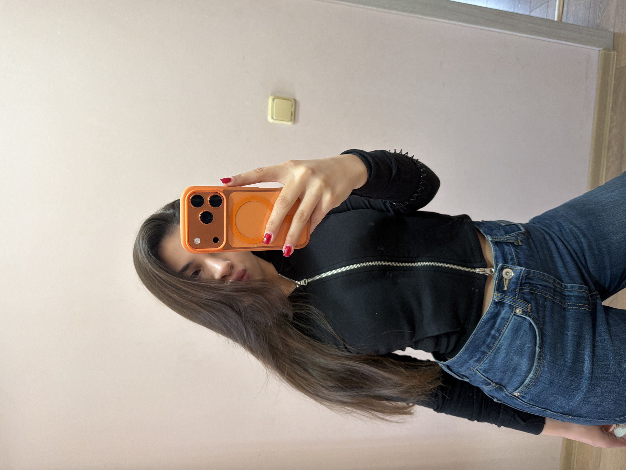 Woman takes mirror selfies in Rudartsi, Bulgaria