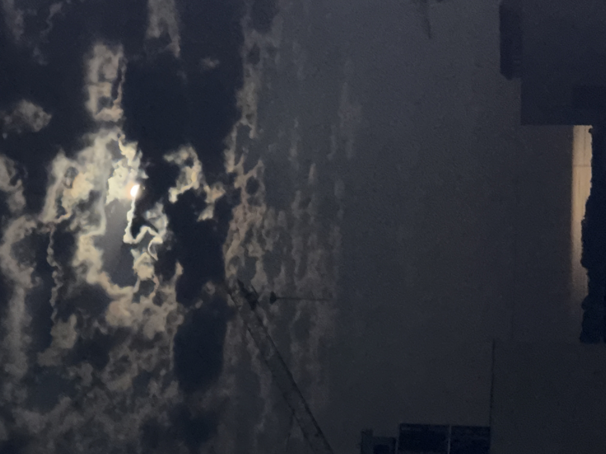 Full moon over Odesa on a cloudy summer night