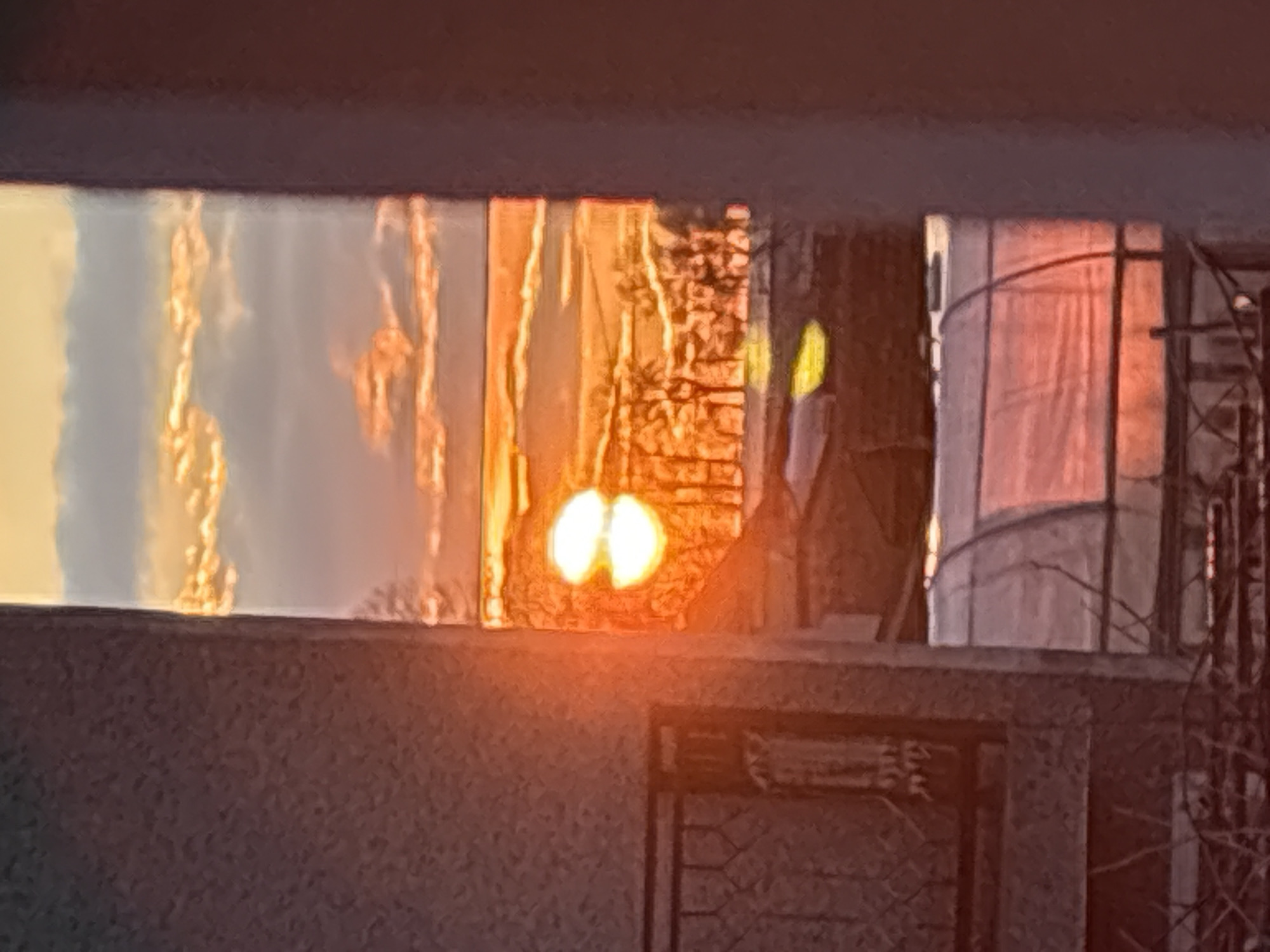 Sunset viewed through windows in Stefan Karadja, Bulgaria