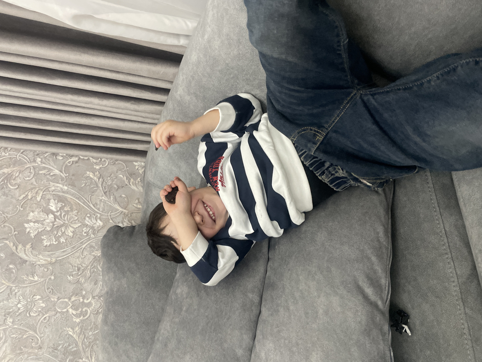 Child plays at home in Akhalkalaki, Georgia residence