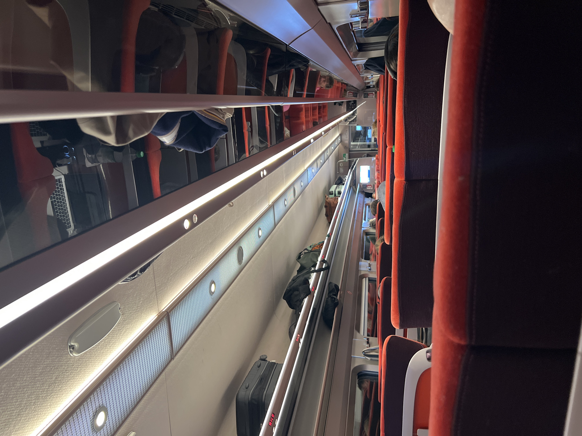 Train interior captured in Seclin showing passenger seating