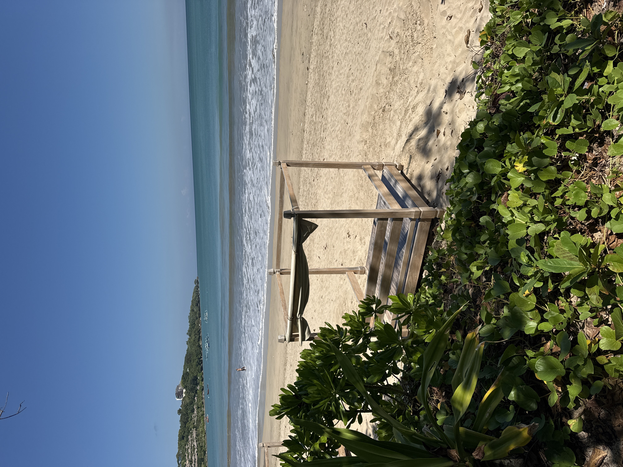 Tourist explores beaches and gardens in Kuta Selatan, Indonesia