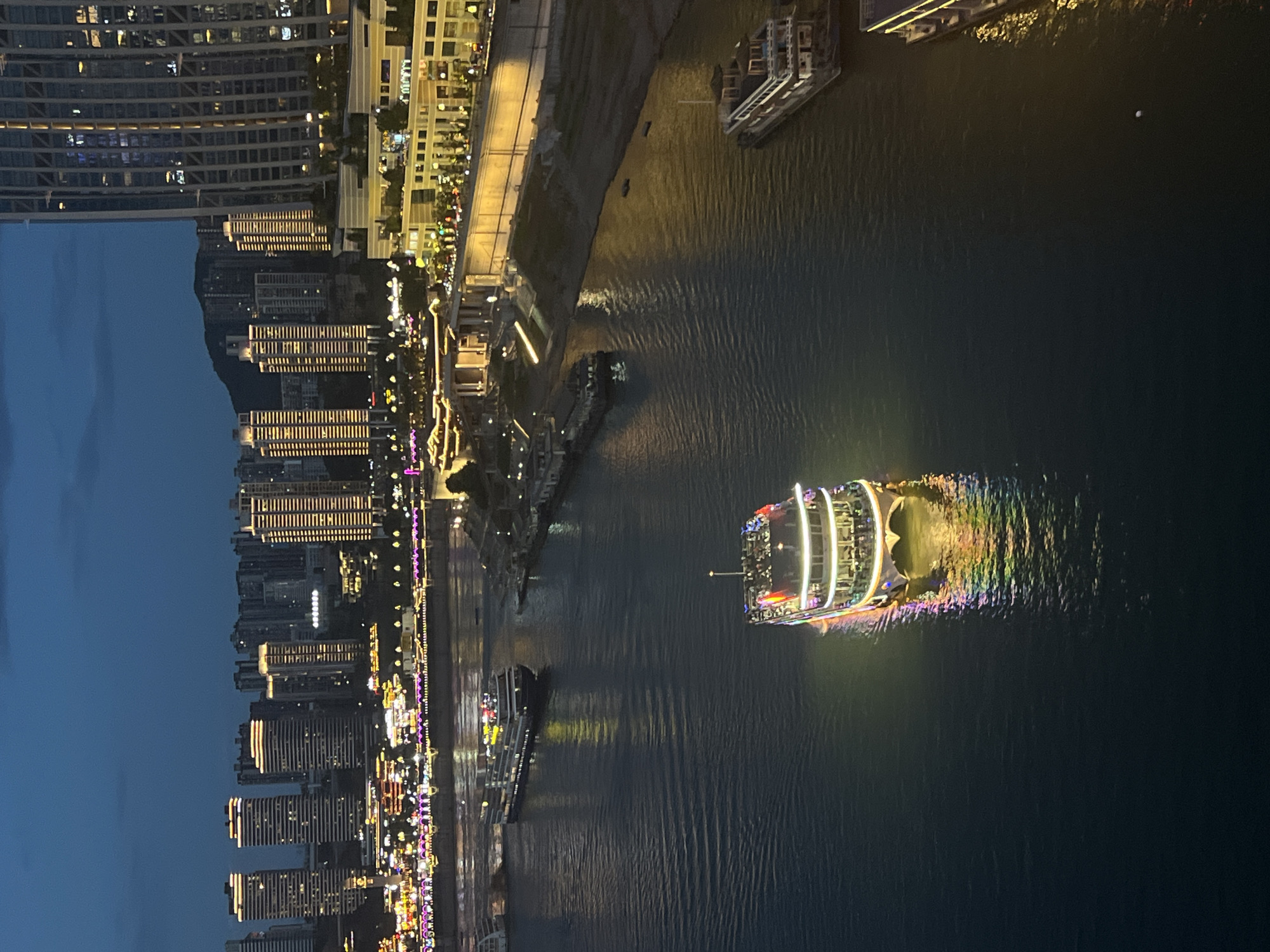 Chongqing's Yuzhong riverfront lights up at dusk