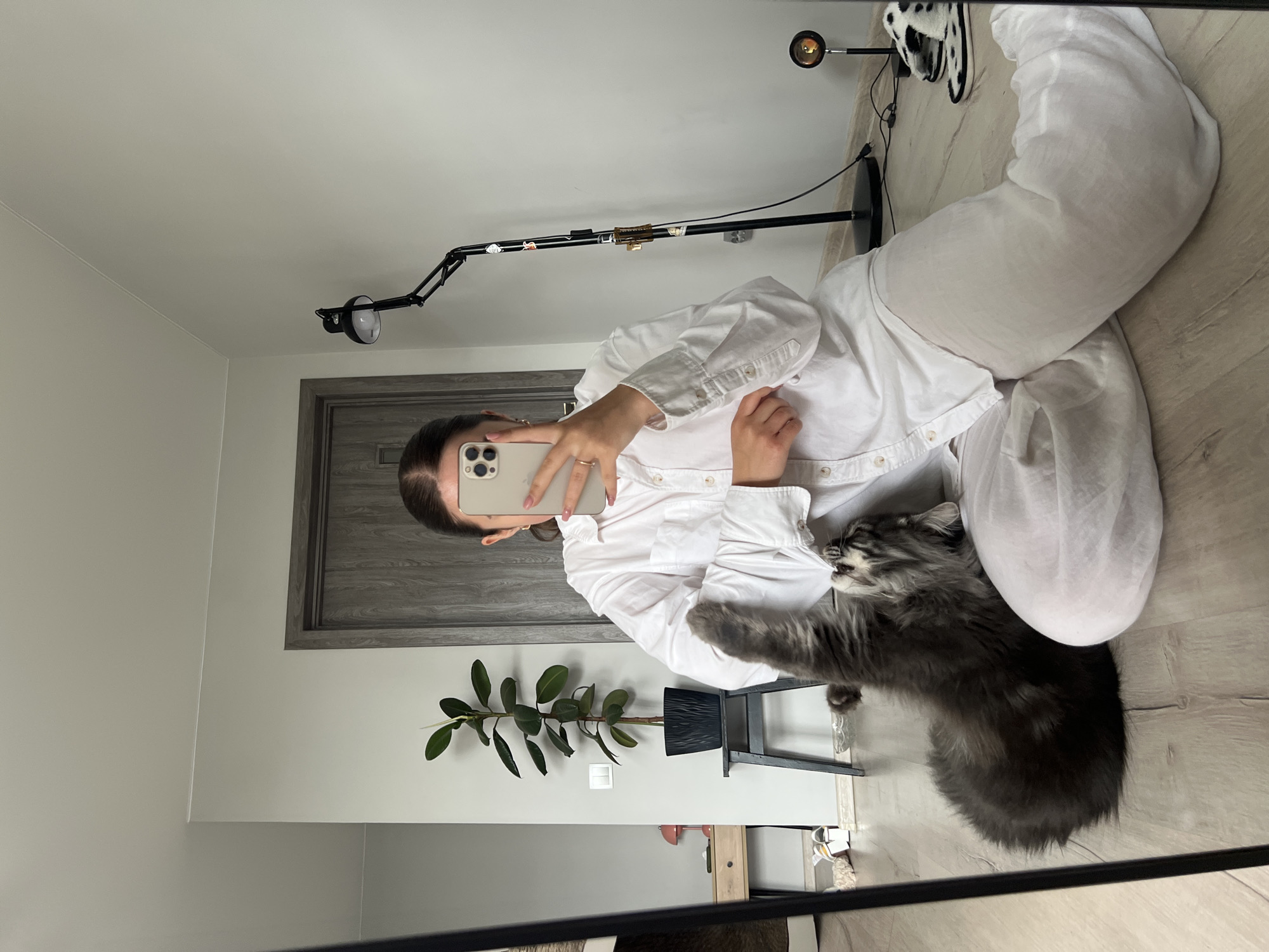 Woman shares morning selfie session with cats in Ternopil