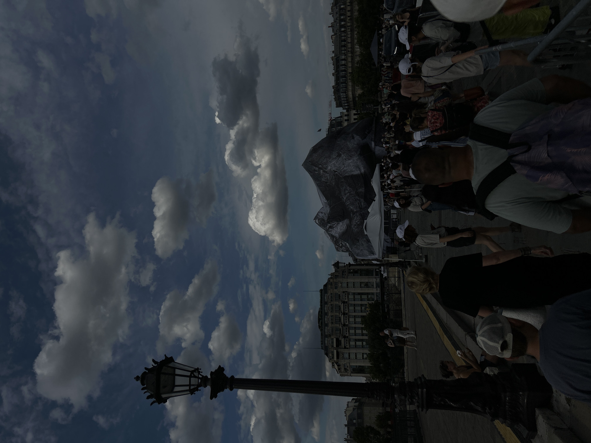 Paris afternoon: riverfront, wrapped bridge, and underground crowds