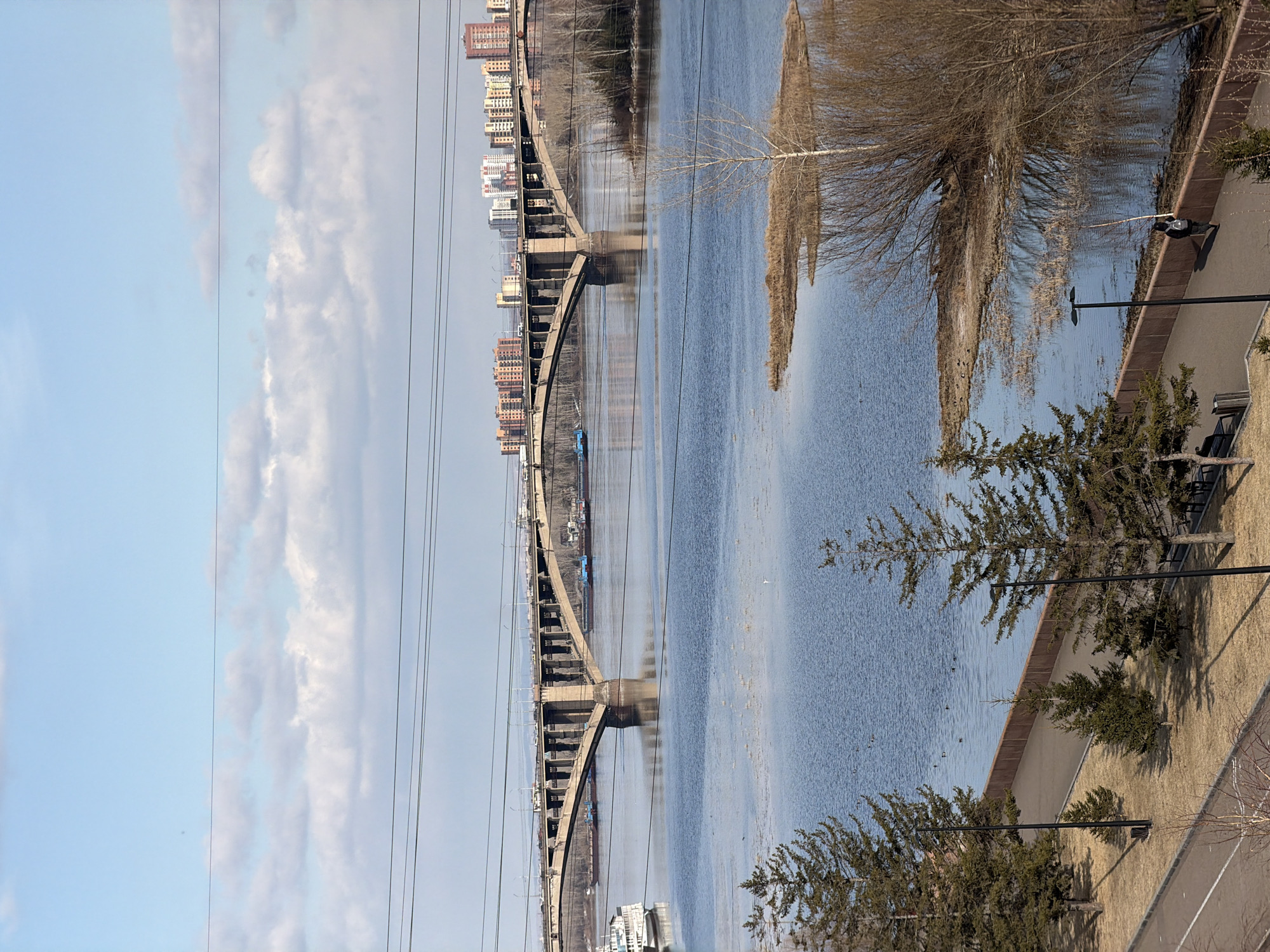 Daytime river views captured at Krasnoyarsk's Vinogradovsky Bridge