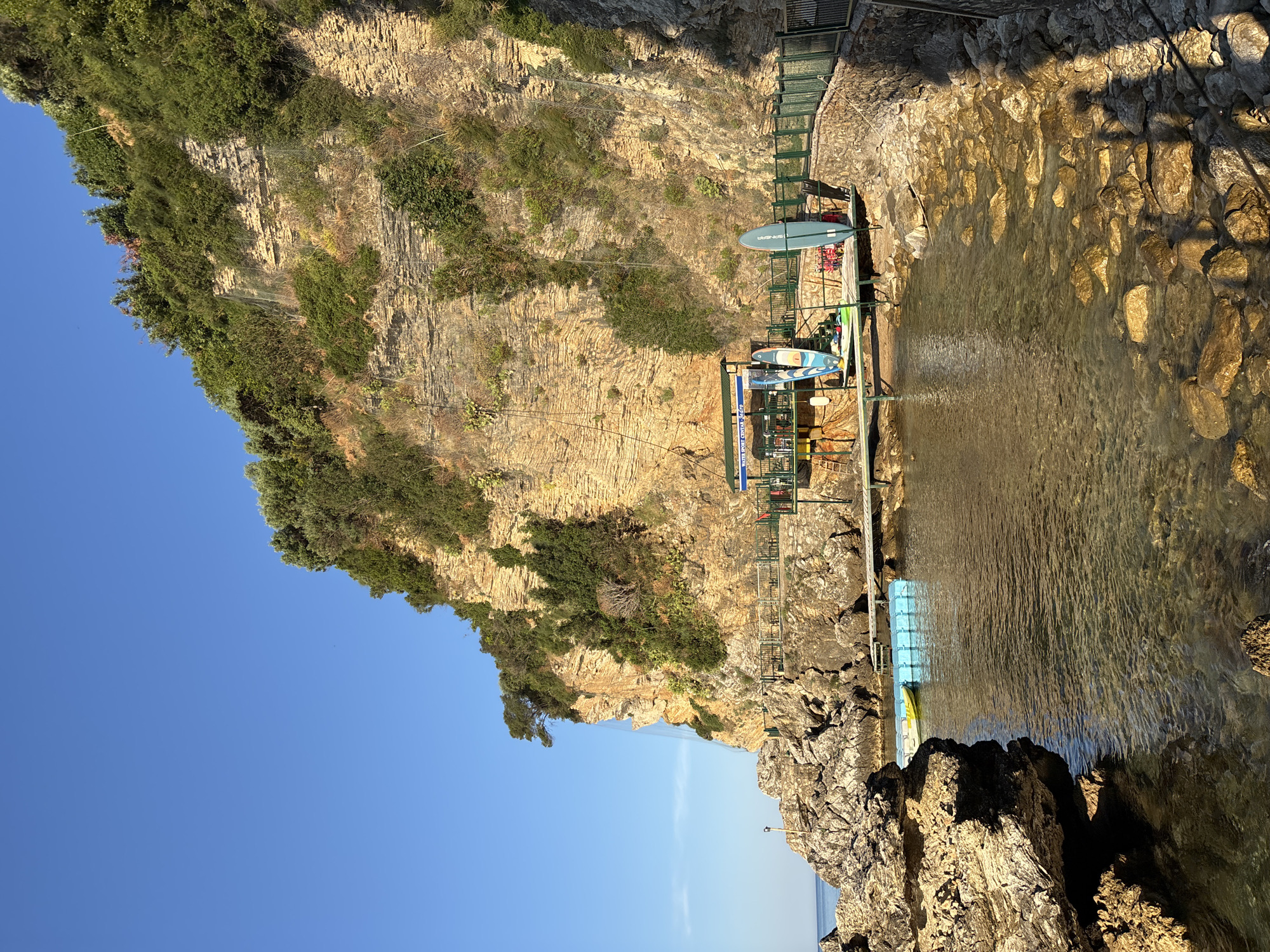Coastal landmarks and city streets on a clear June day