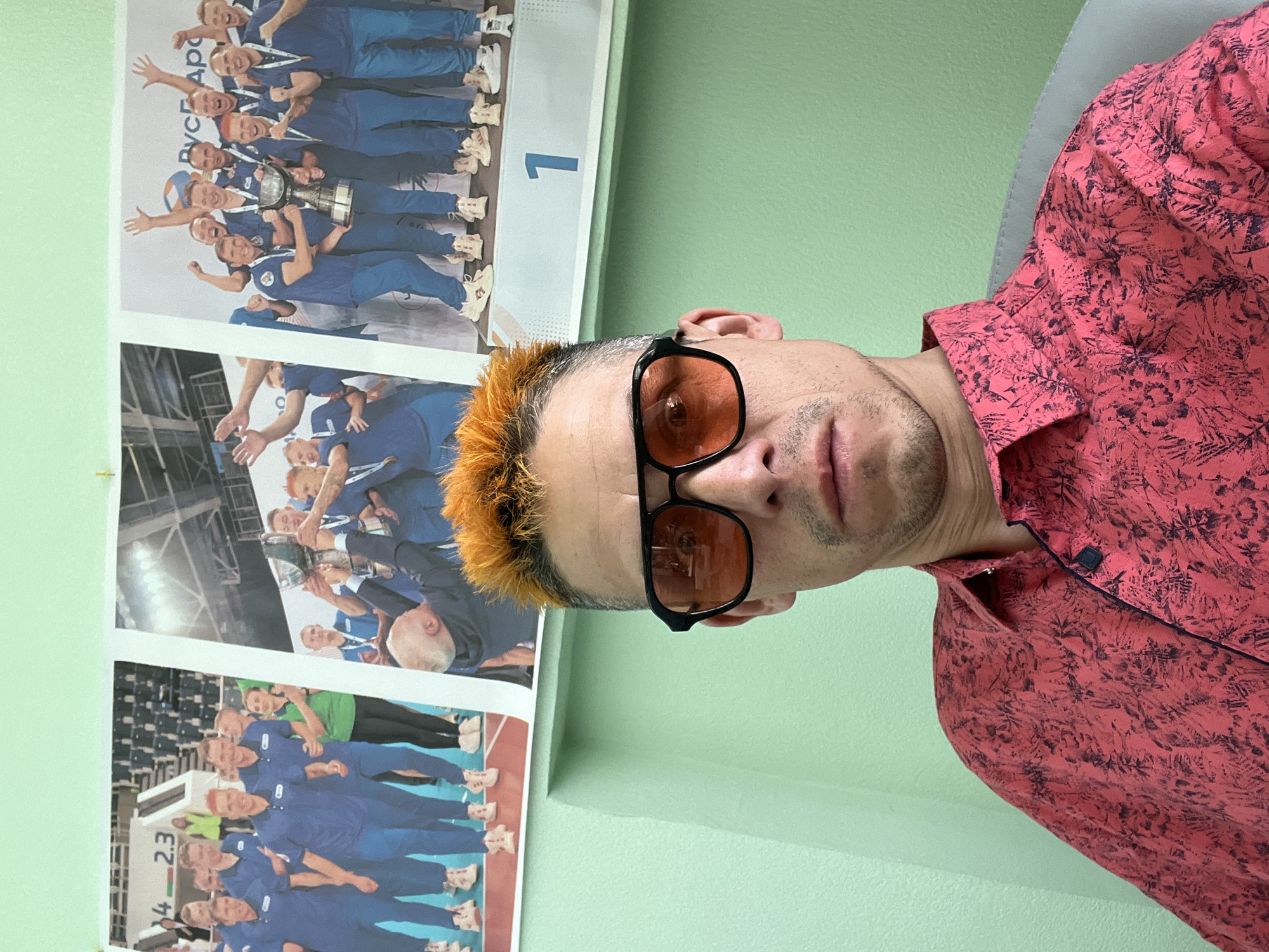 Orange-haired person photographed multiple times indoors in Chaikovsky, Russia