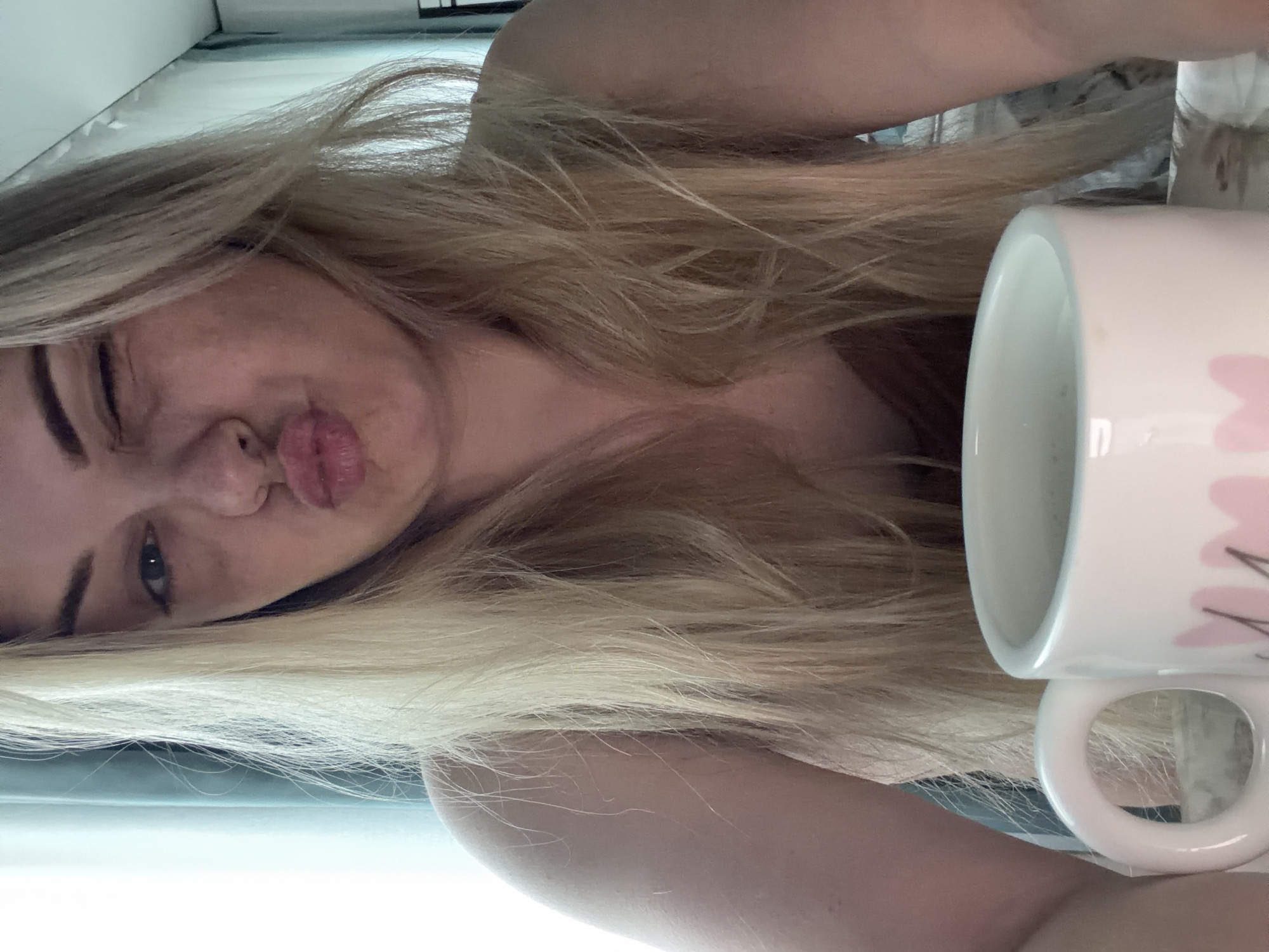 Morning coffee moment captured alongside crane truck in Votkinsk