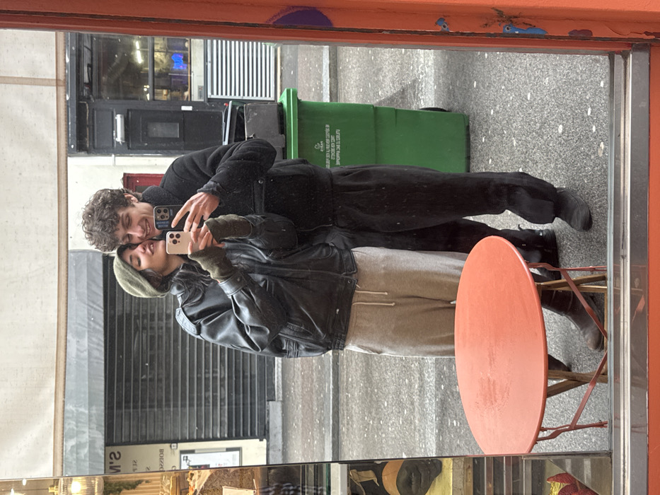 Couple Takes Mirror Selfies Across Paris Streets