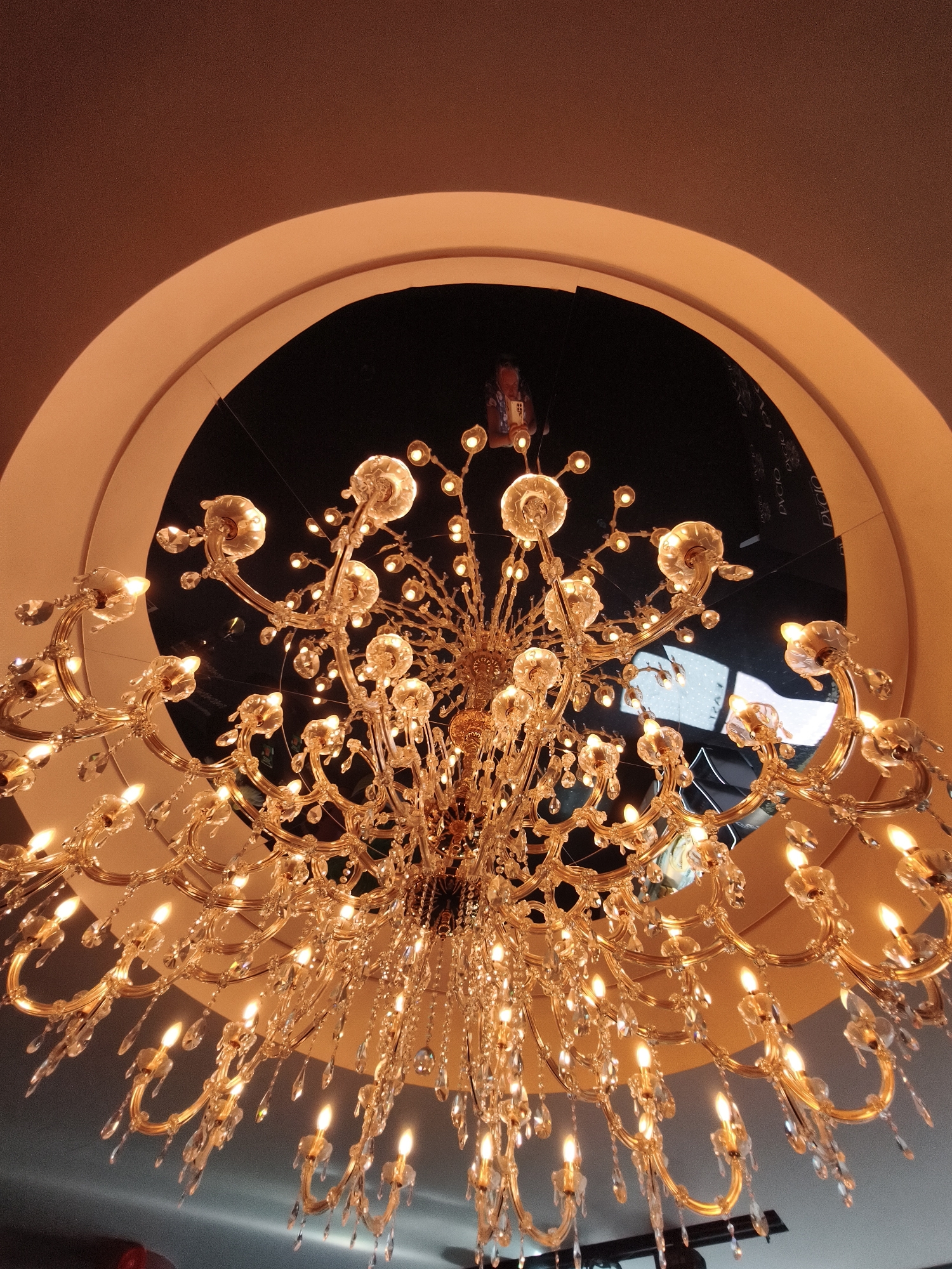 Chandelier close-ups, a passing tram, and a flower-lined terrace in Tallinn