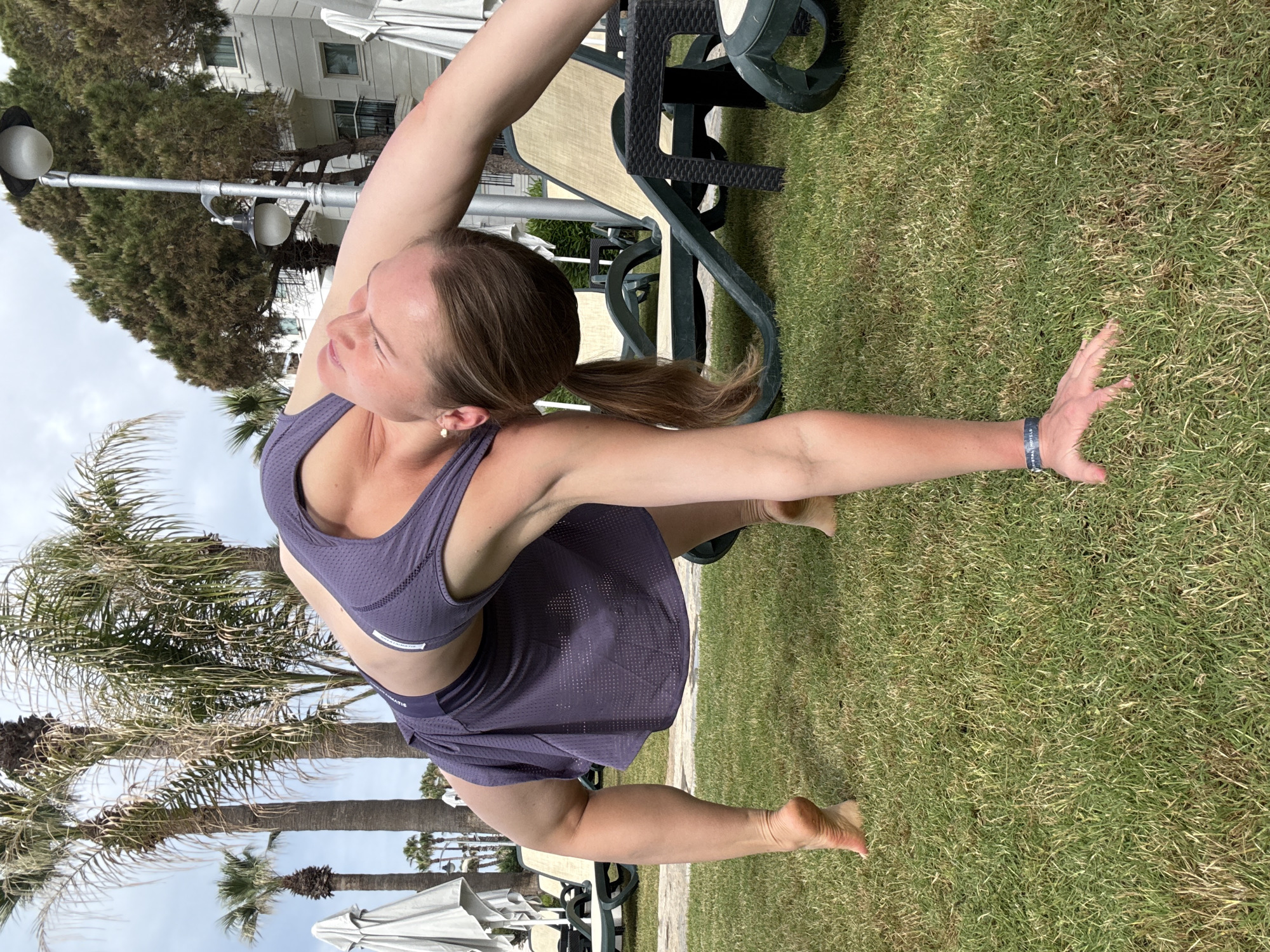Morning yoga session at Turkish resort captured alongside tropical bird