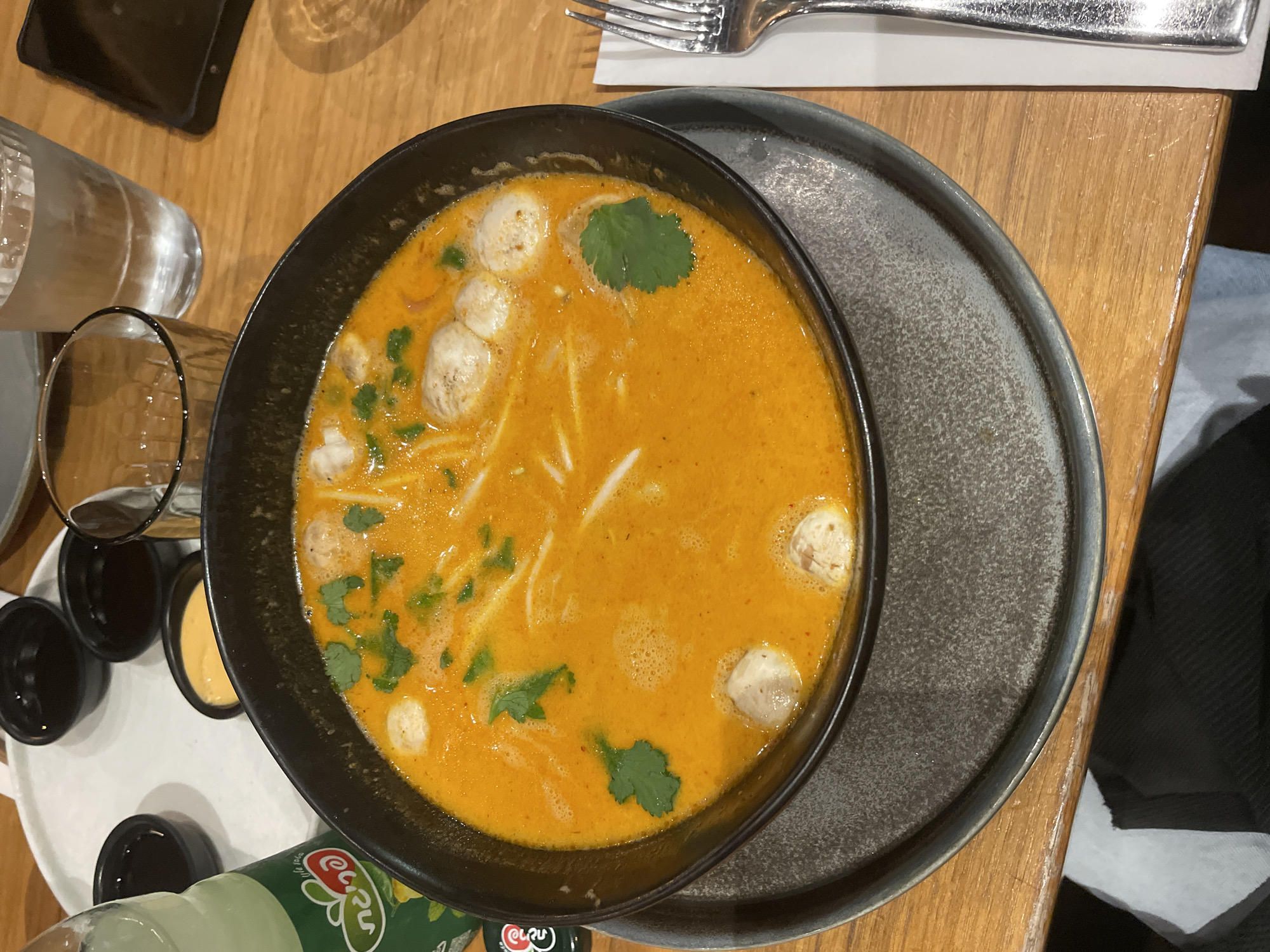 Couple documents Asian dinner experience in Raanana restaurant