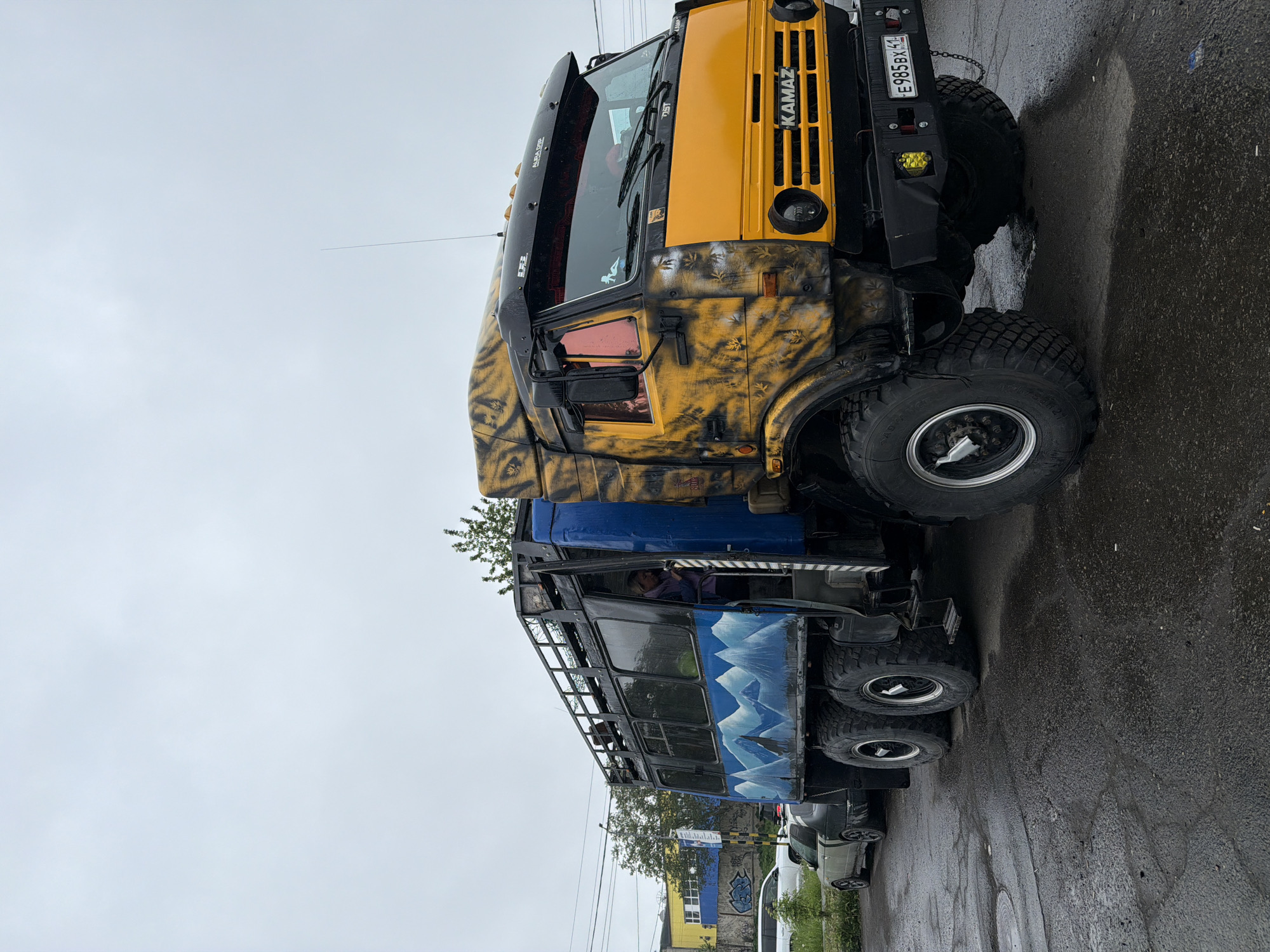 Tiger-striped Kamaz truck and street life in Petropavlovsk-Kamchatsky